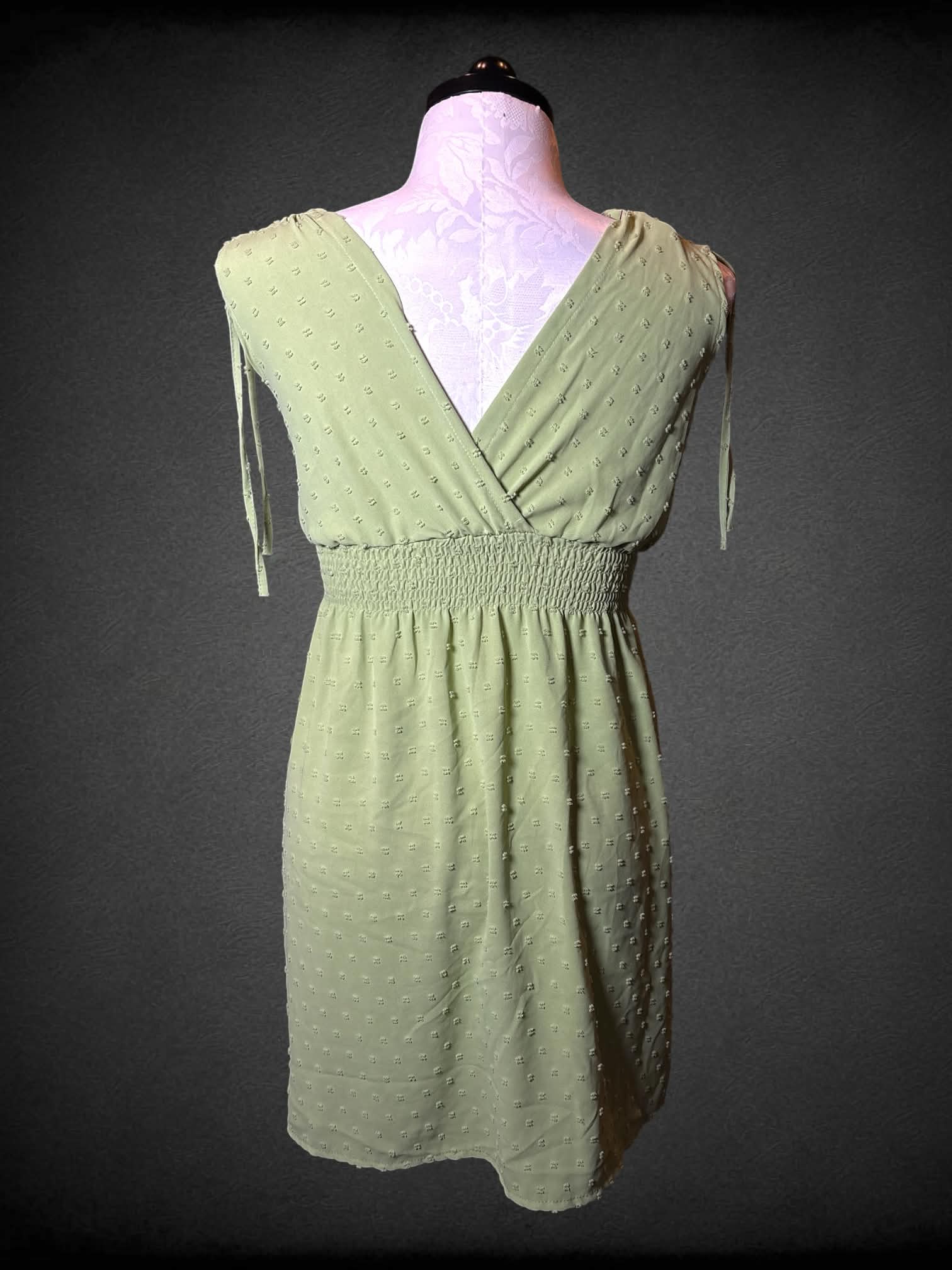 XL sage green dress with shirred waist, asymmetrical wrap top and spotted pattern