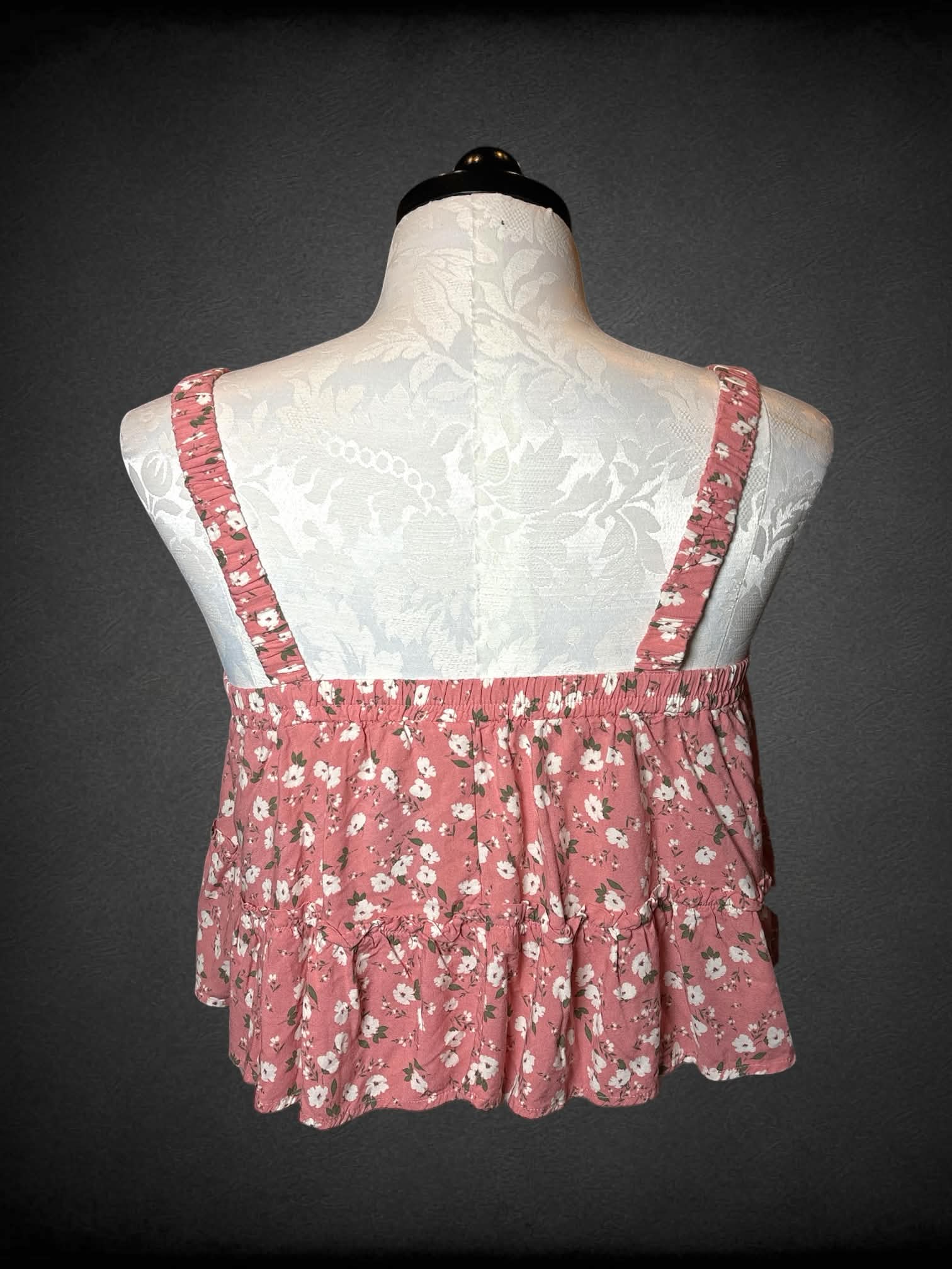 0X LoveSick pink flowy tank top with white floral pattern