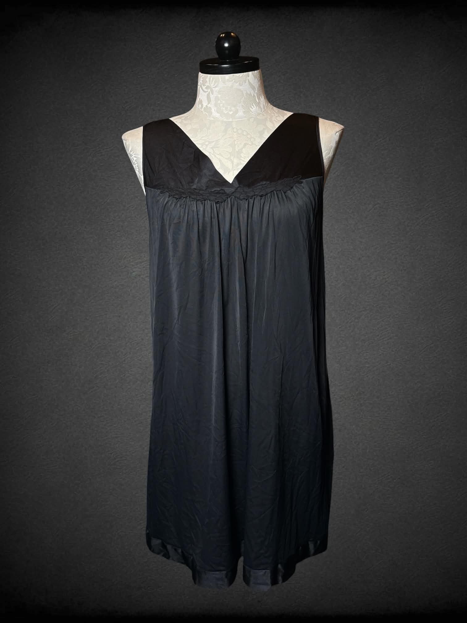 XL Vanity Fair black slip dress with sewn floral hem on front