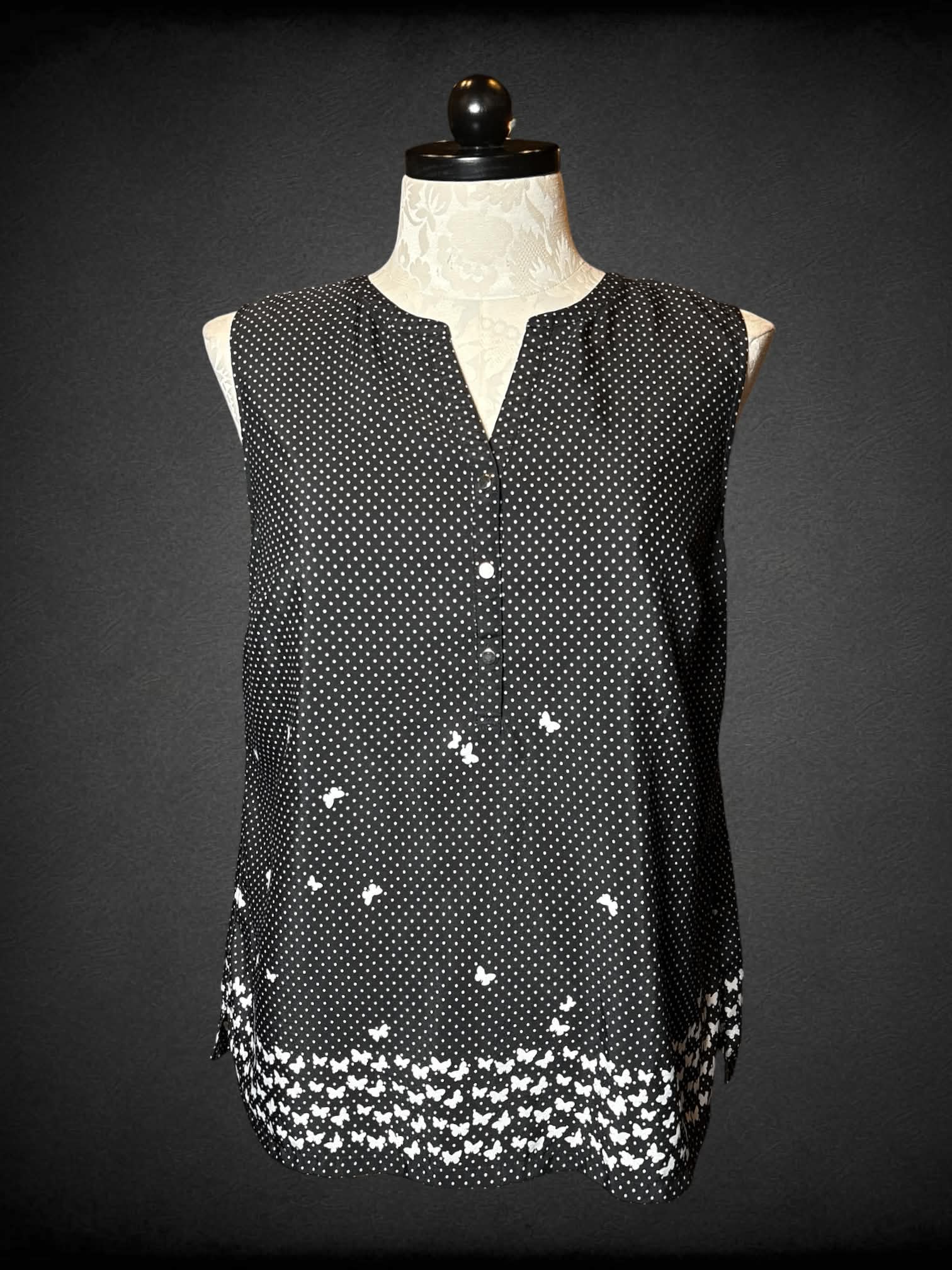 0X Jones New York black flowy blouse with white polka dot and butterfly pattern, and buttons on front