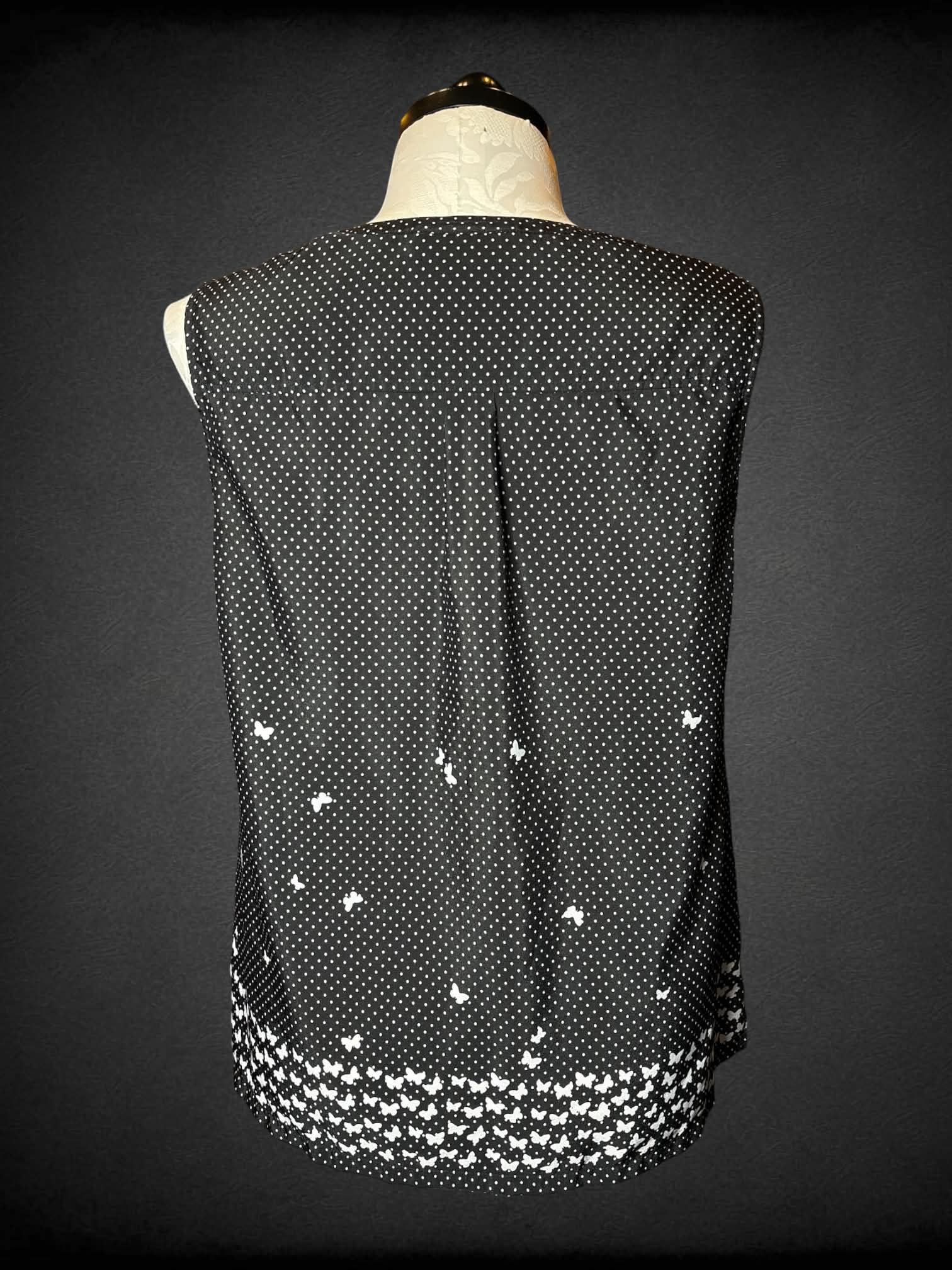 0X Jones New York black flowy blouse with white polka dot and butterfly pattern, and buttons on front