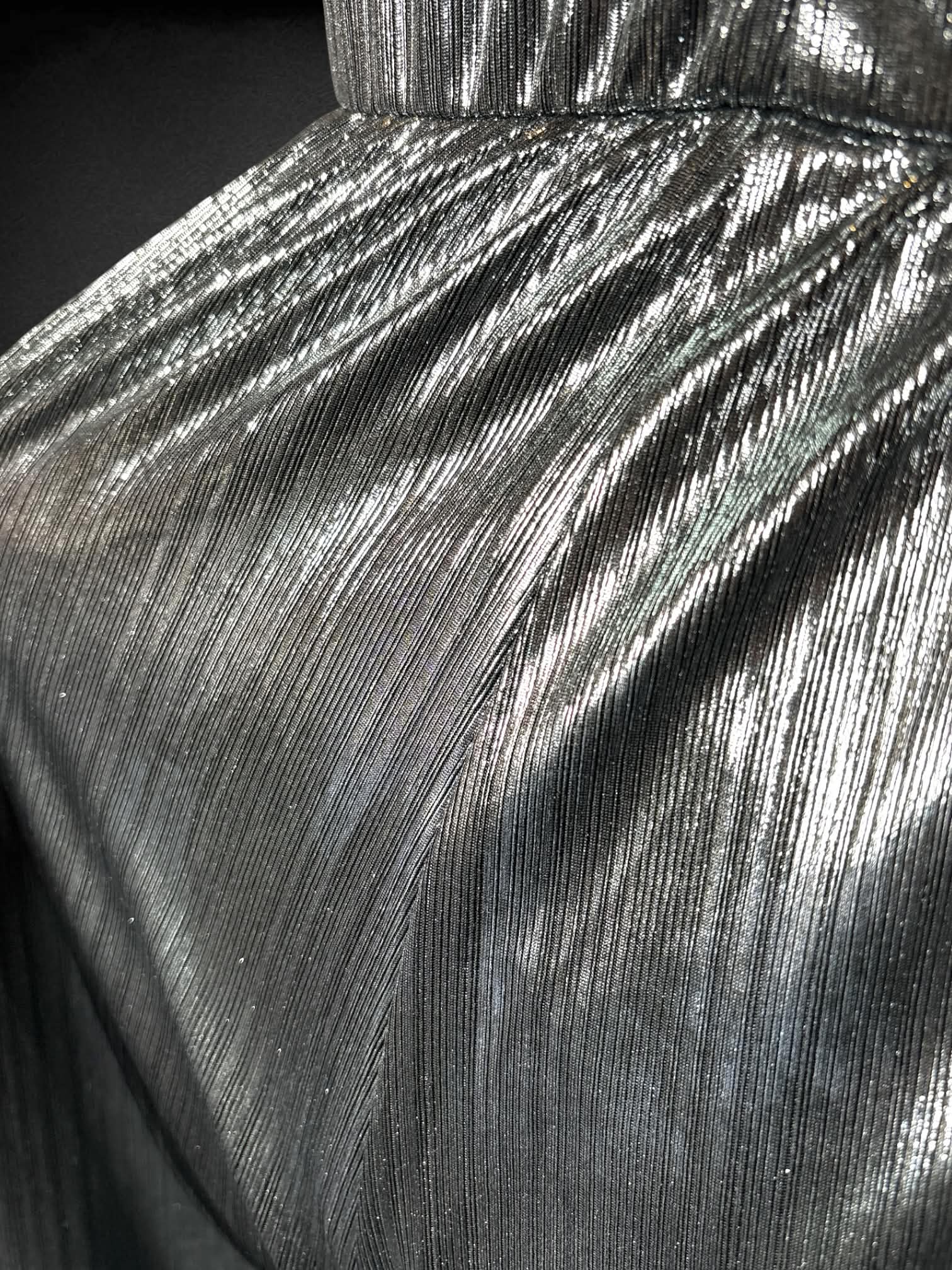 0X Francesca’s silver ribbed jumpsuit with zipper on back