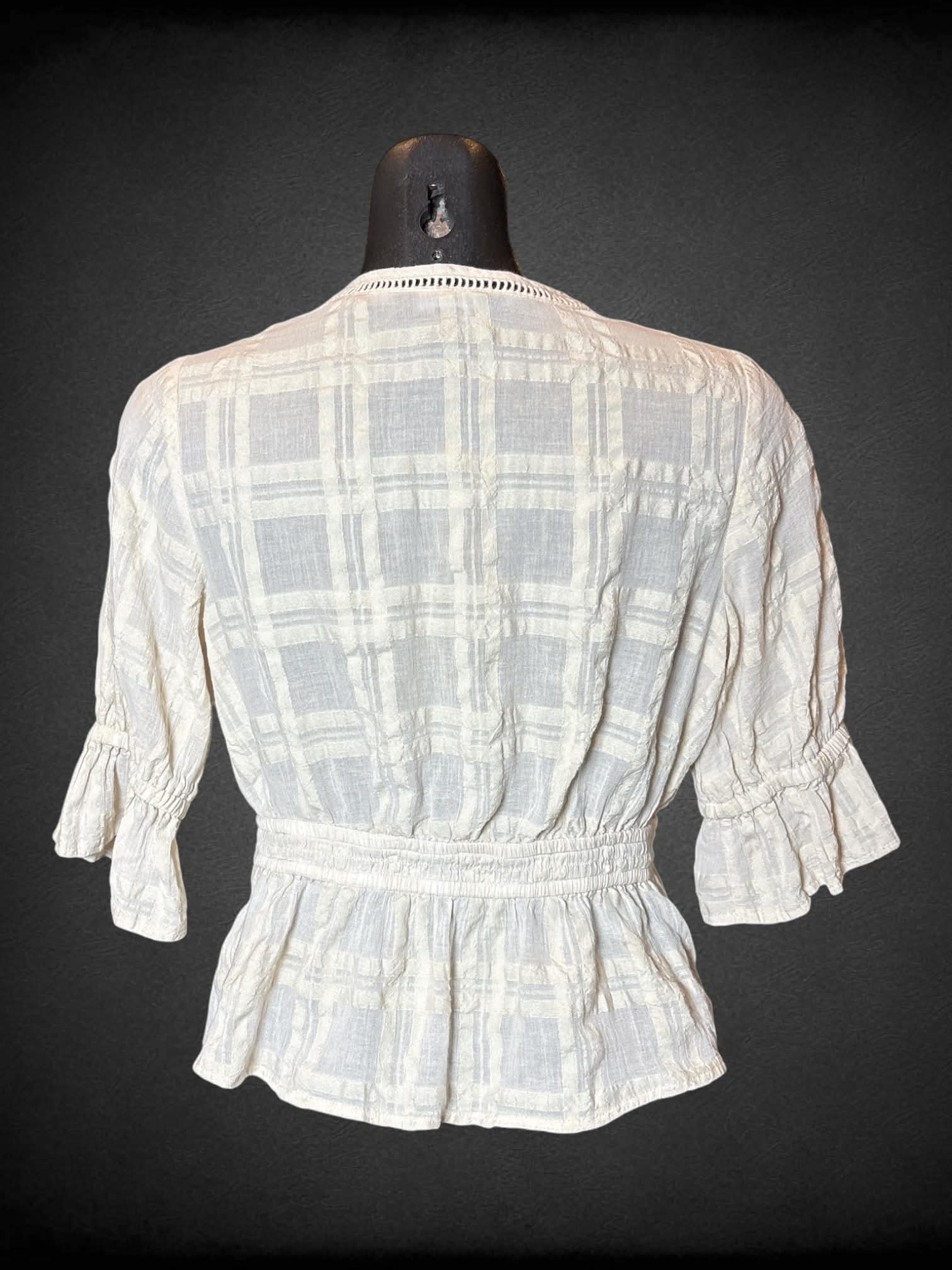 S Express off-white sheer blouse with buttons on front, and shirred waist