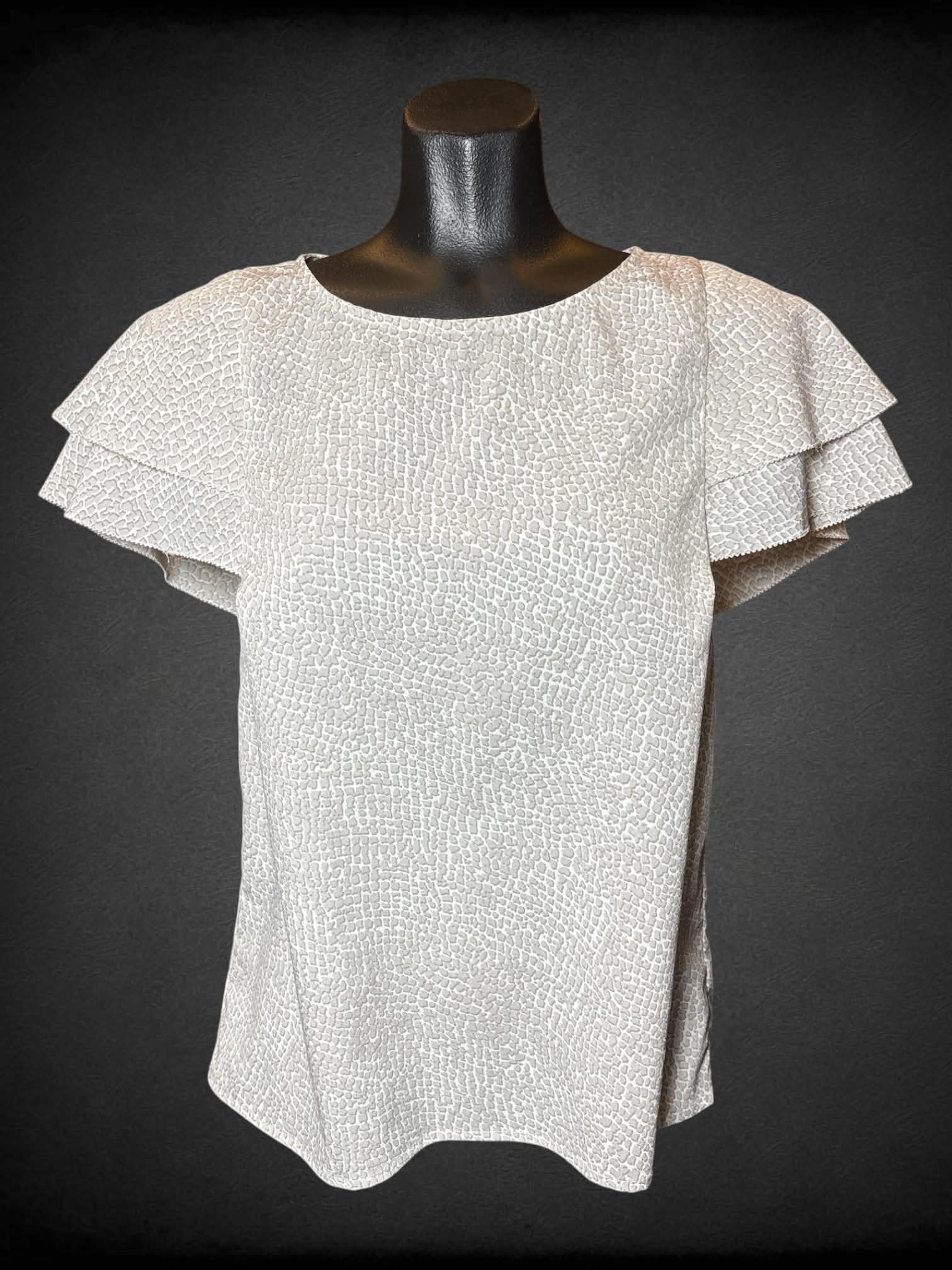 M Banana Republic white flowy blouse with spotted brown pattern, and button on back
