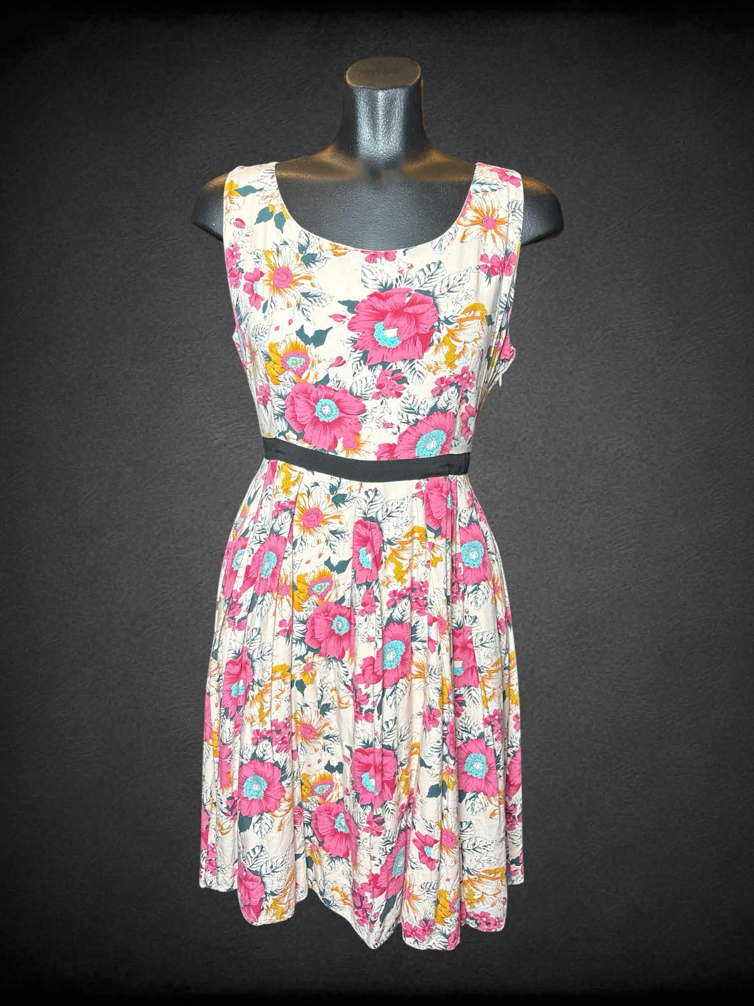 M Frock Shop pink dress with floral pattern, pockets, zipper on side and adjustable tie on waist