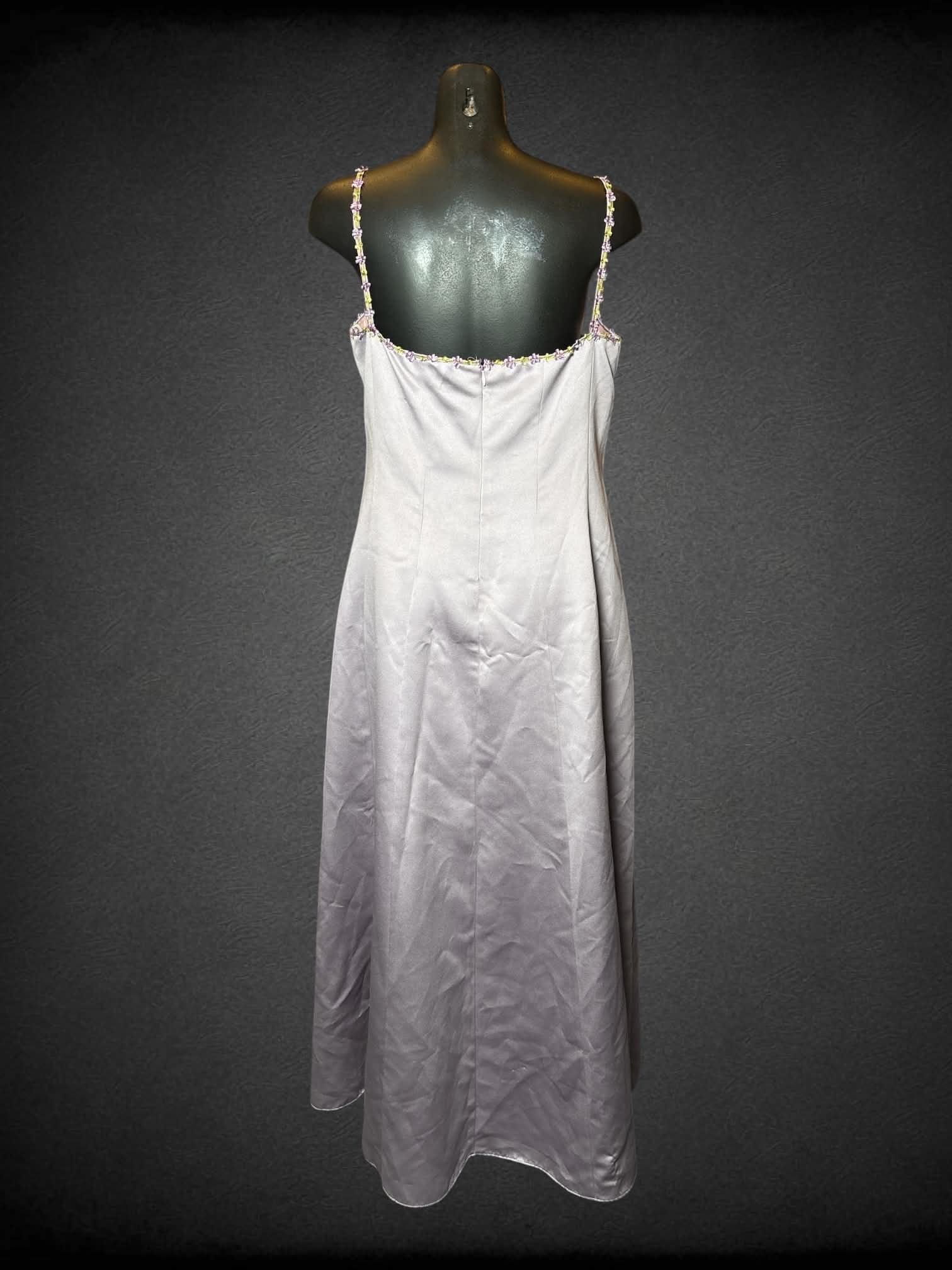 M Michelangelo vintage lilac dress with flower detailing on neckline and straps, zipper on side, and padded bra inside