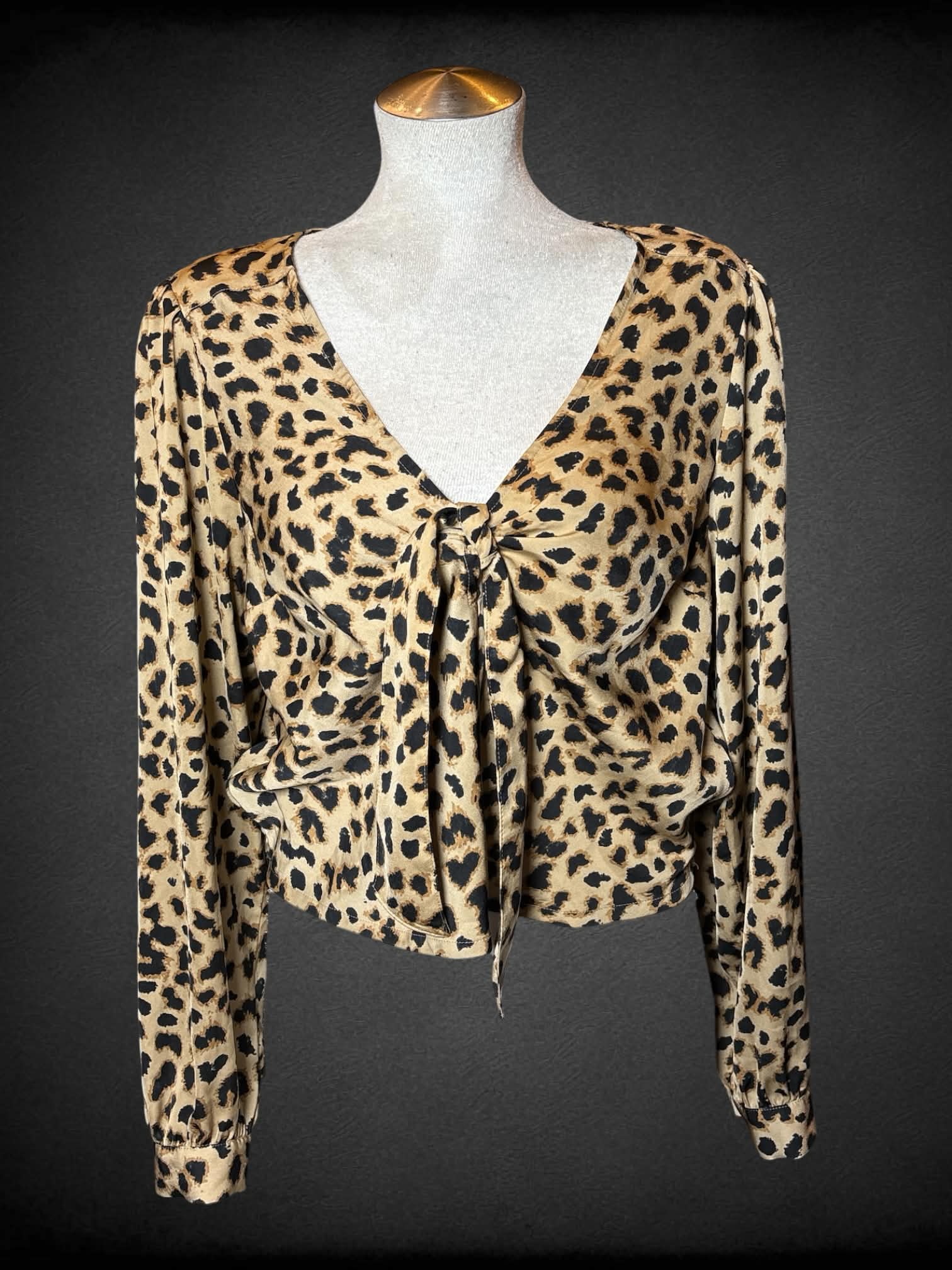 L Express brown blouse with leopard print pattern and twist tie on front