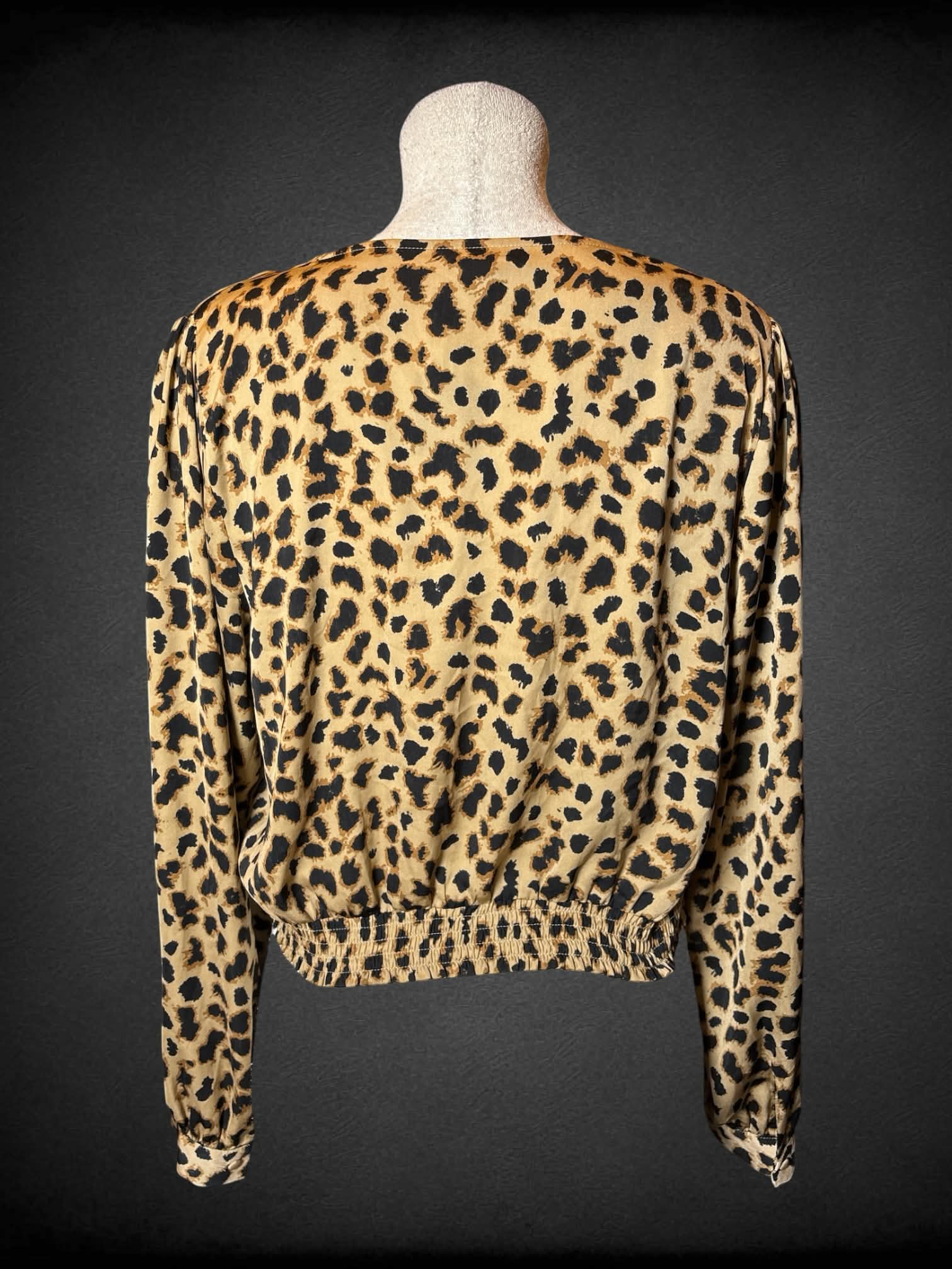L Express brown blouse with leopard print pattern and twist tie on front