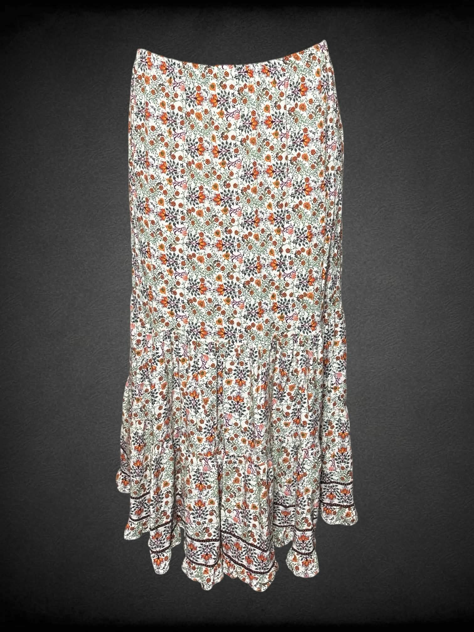 L Max Studio white flowy skirt with colorful botanical pattern, and stretch waist