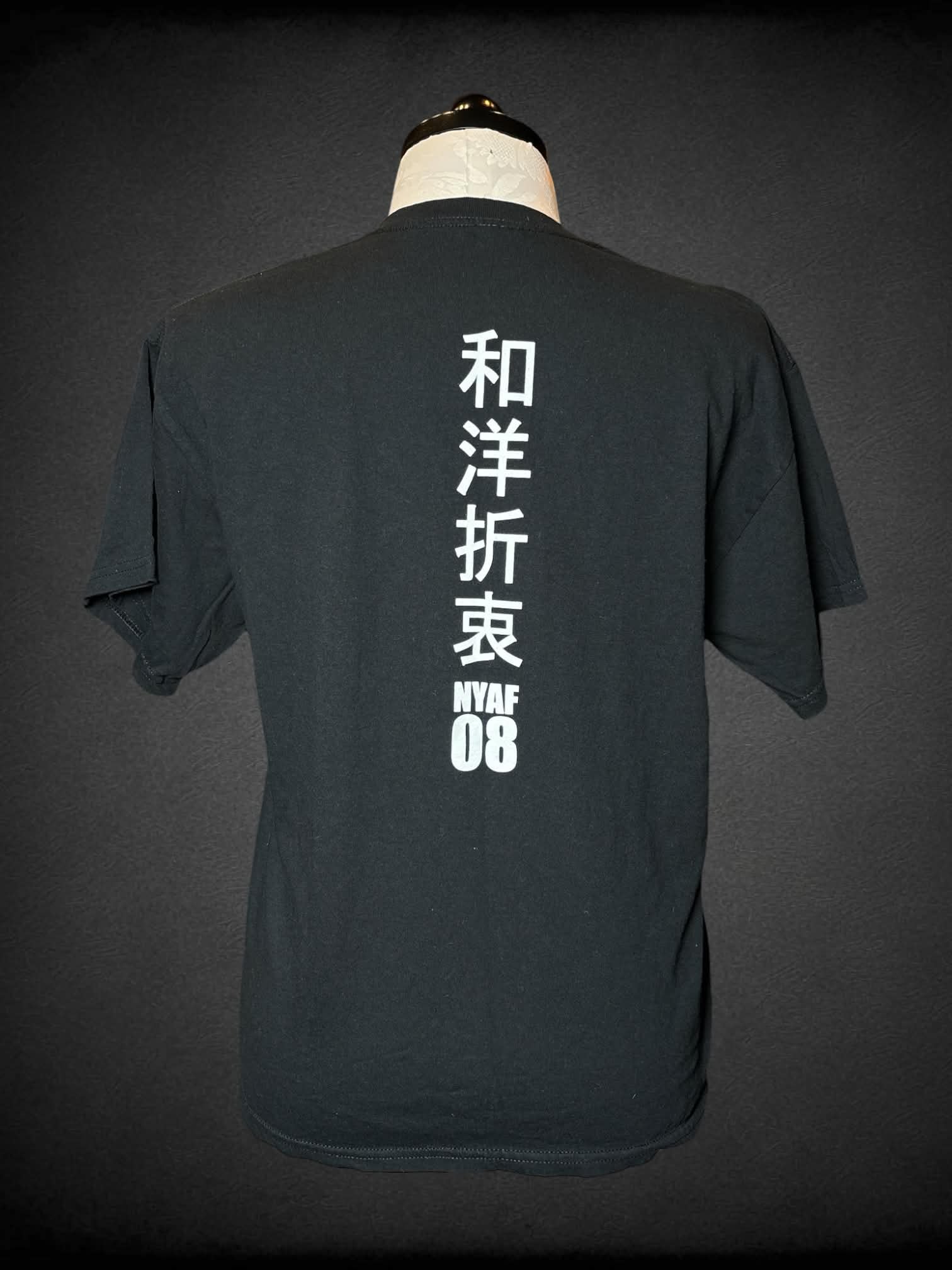 1X Gildan black t shirt with “New York Anime Festival” graphic on front, and Japanese writing on back