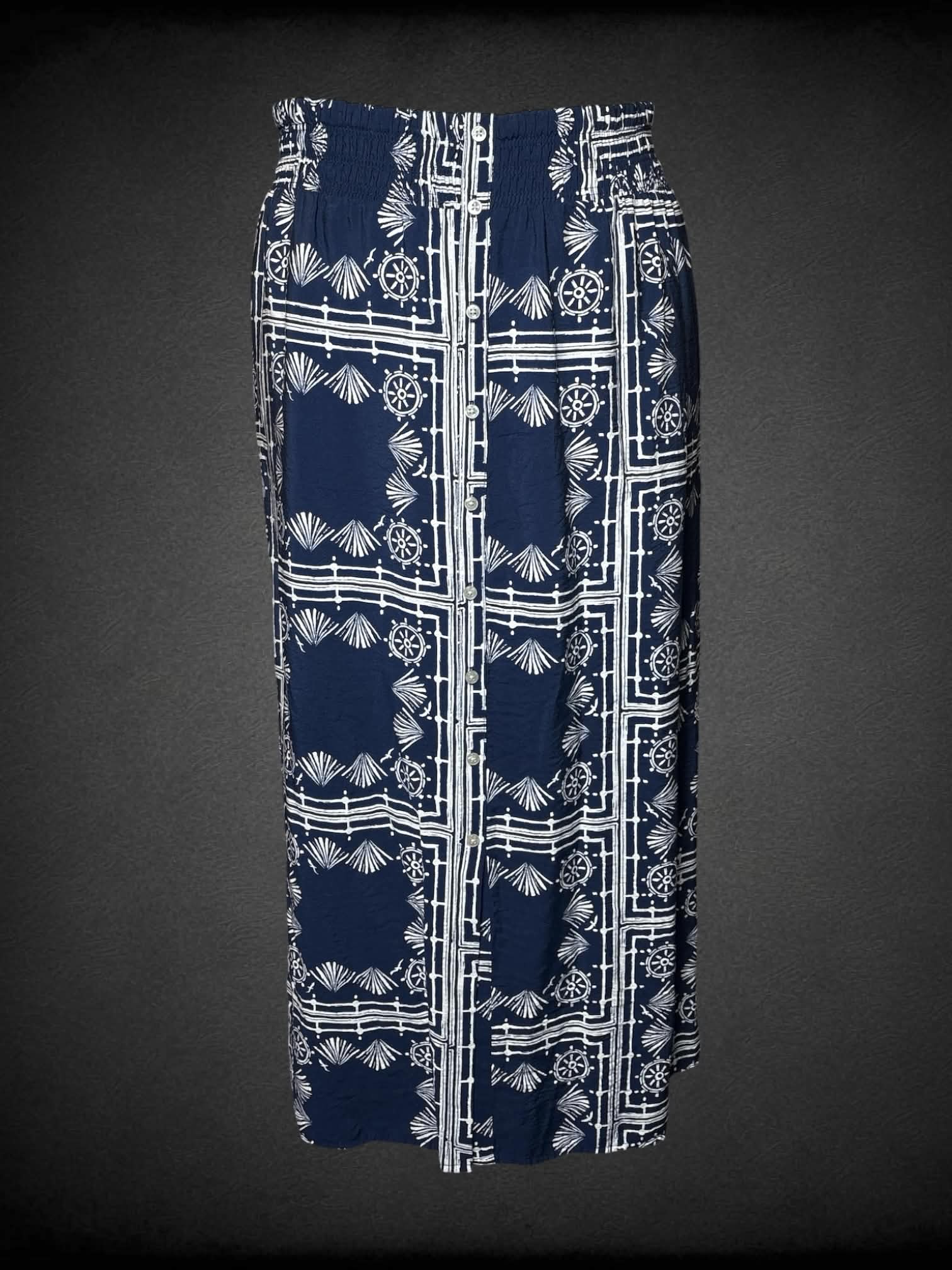 4X Sonoma navy blue flowy skirt with white ornamental pattern, decorative buttons on front, and stretch waist