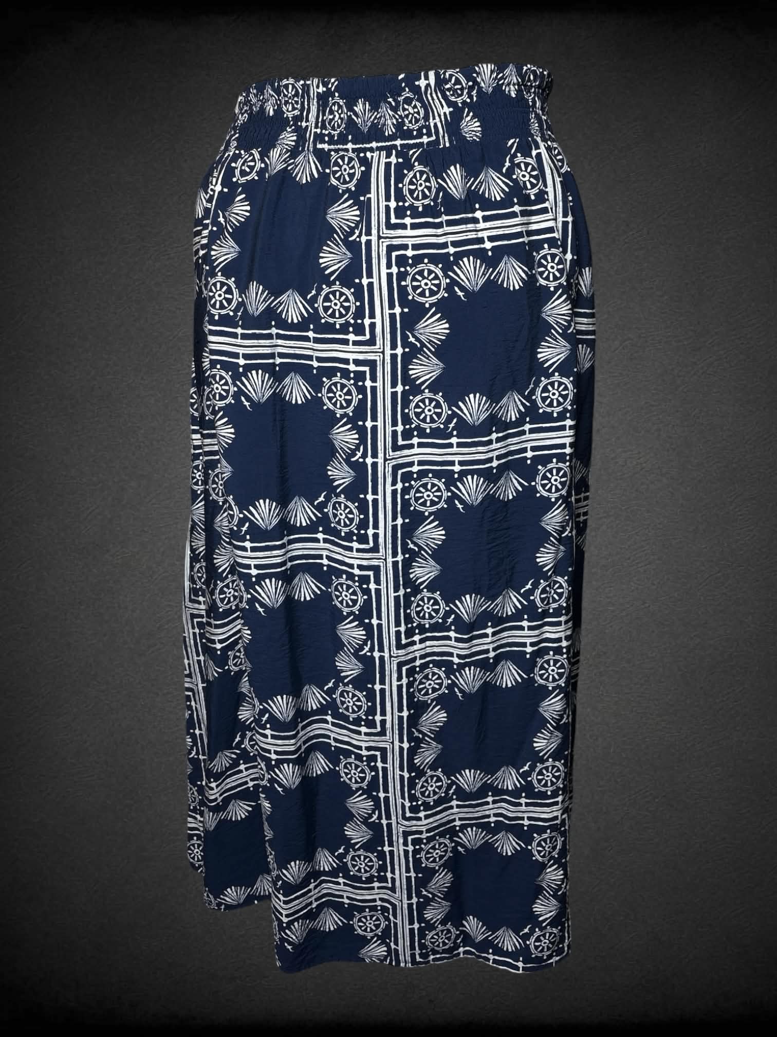 4X Sonoma navy blue flowy skirt with white ornamental pattern, decorative buttons on front, and stretch waist