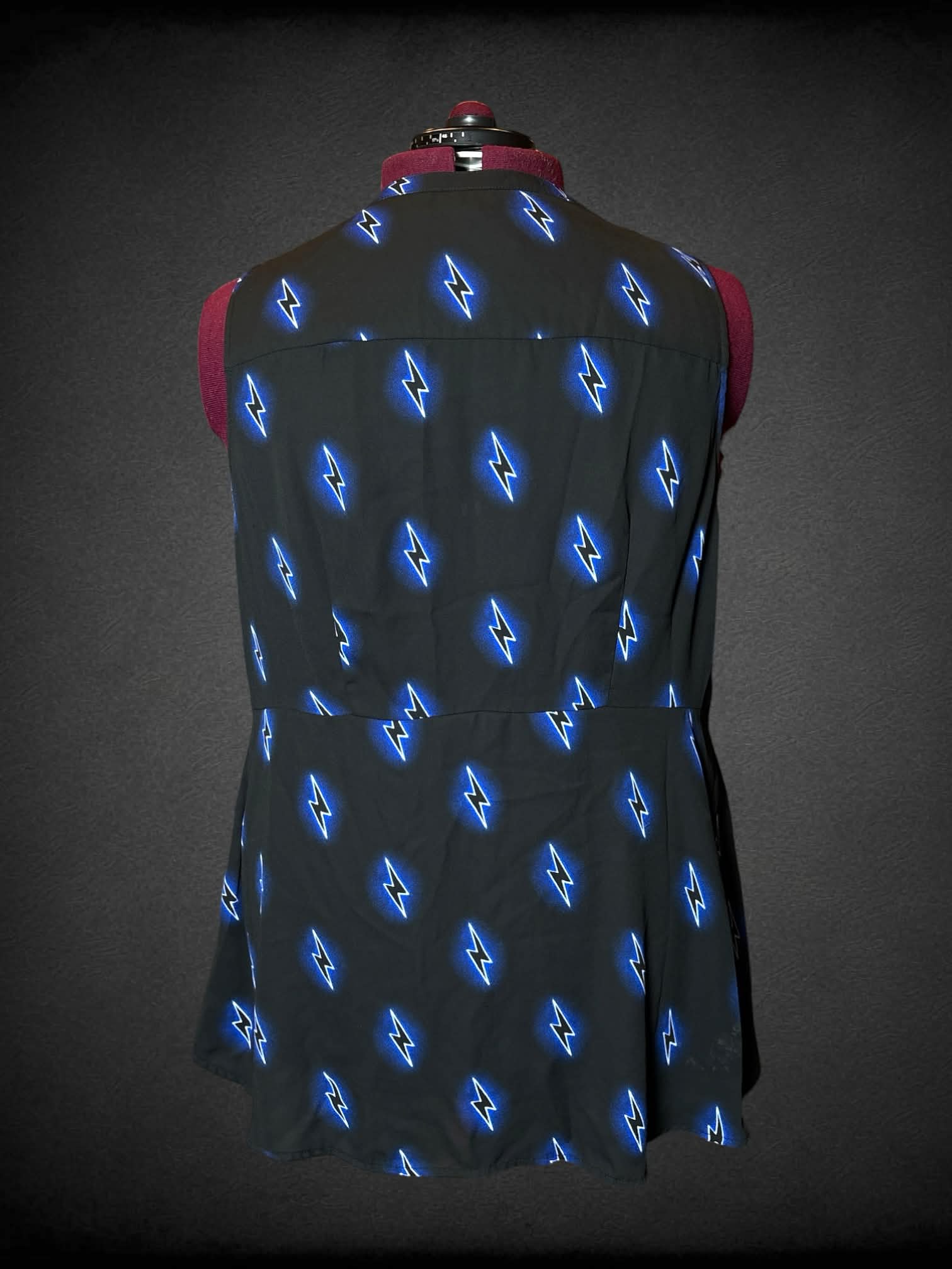 2X black button-up shirt with blue neon lightning bolt design