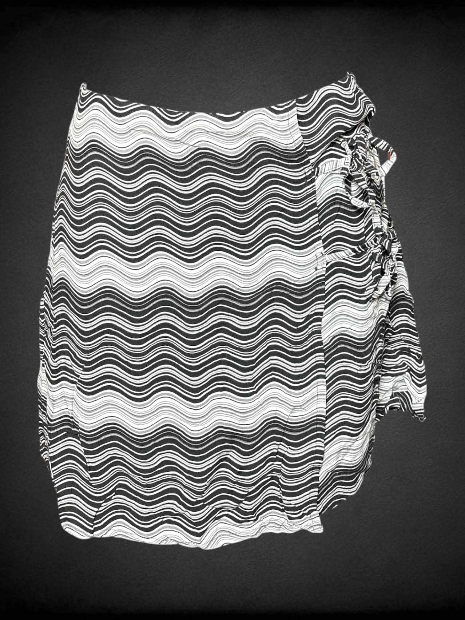 S SO black & white skirt with wave pattern, tie on sides, and zipper on back
