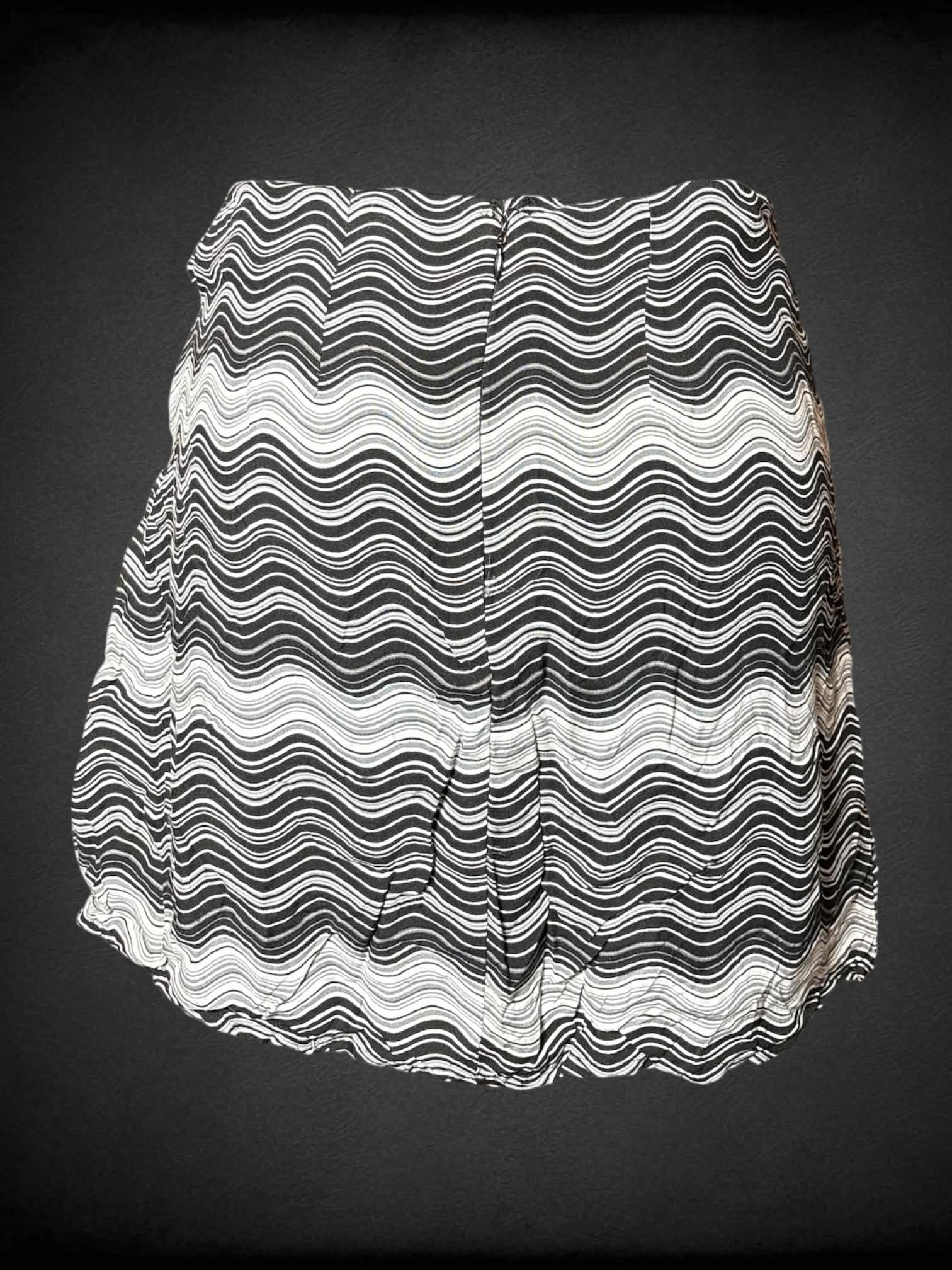 S SO black & white skirt with wave pattern, tie on sides, and zipper on back