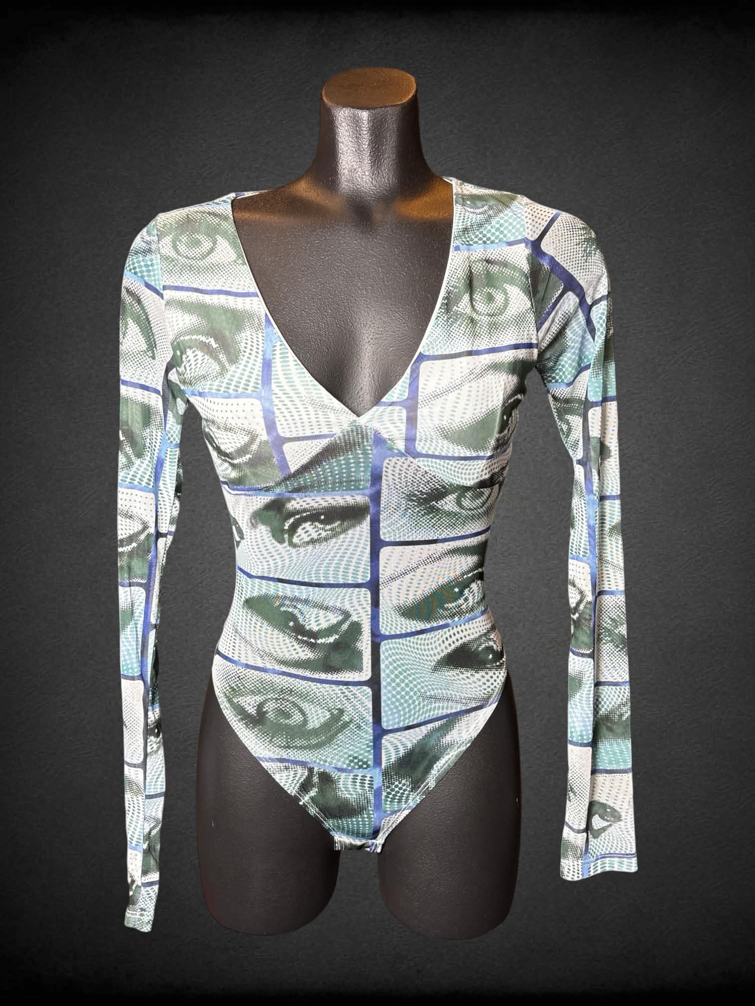 M Fashion Nova sheer white body suit with green eye pattern