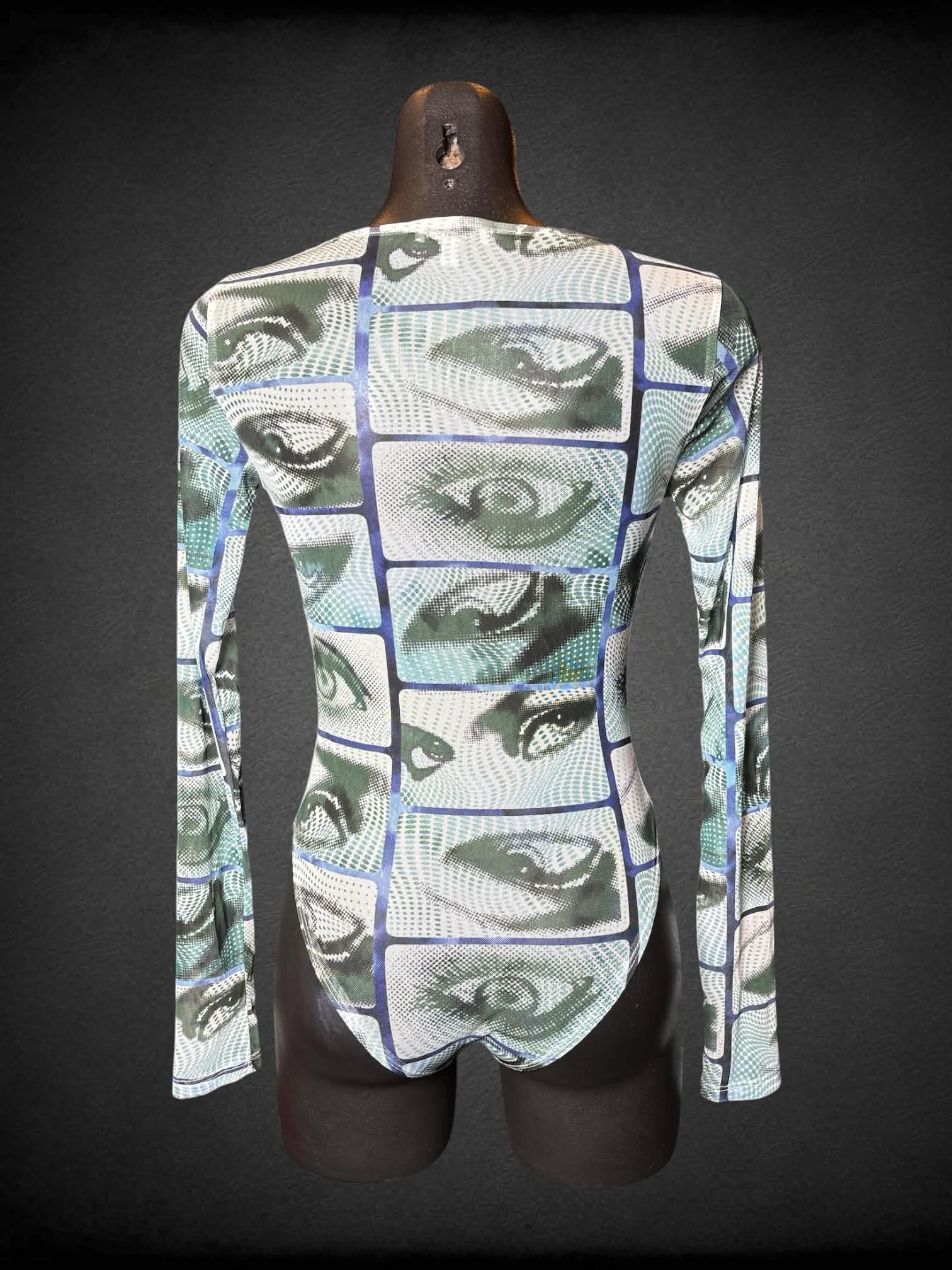 M Fashion Nova sheer white body suit with green eye pattern