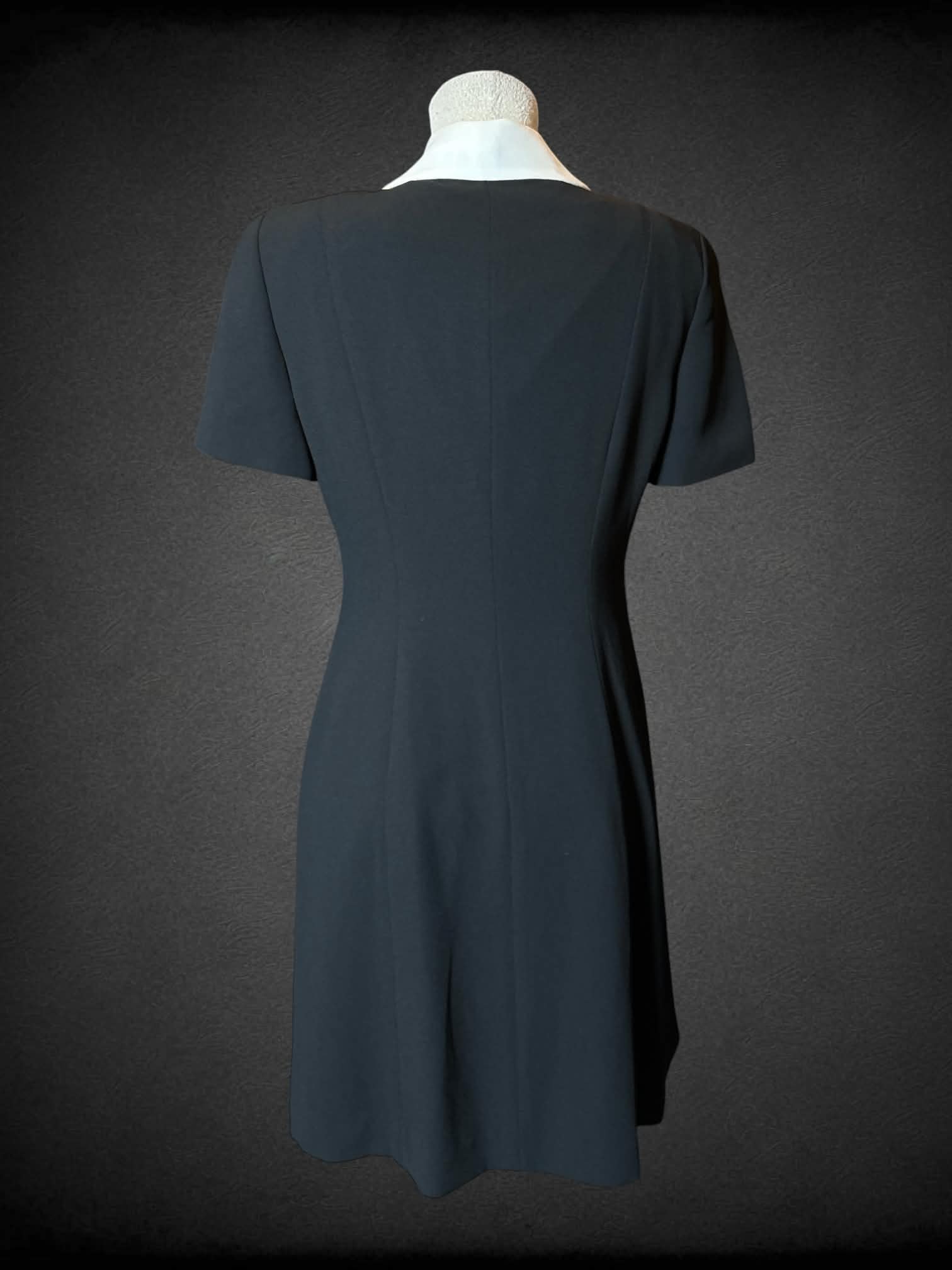 L Jones Wear vintage black button-up dress with white collar, and padded shoulders