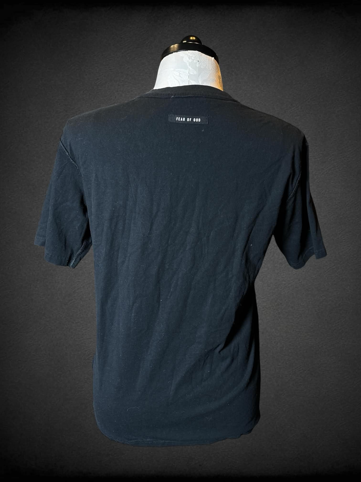 1X Fear of God designer black t shirt with “FG” writing on front