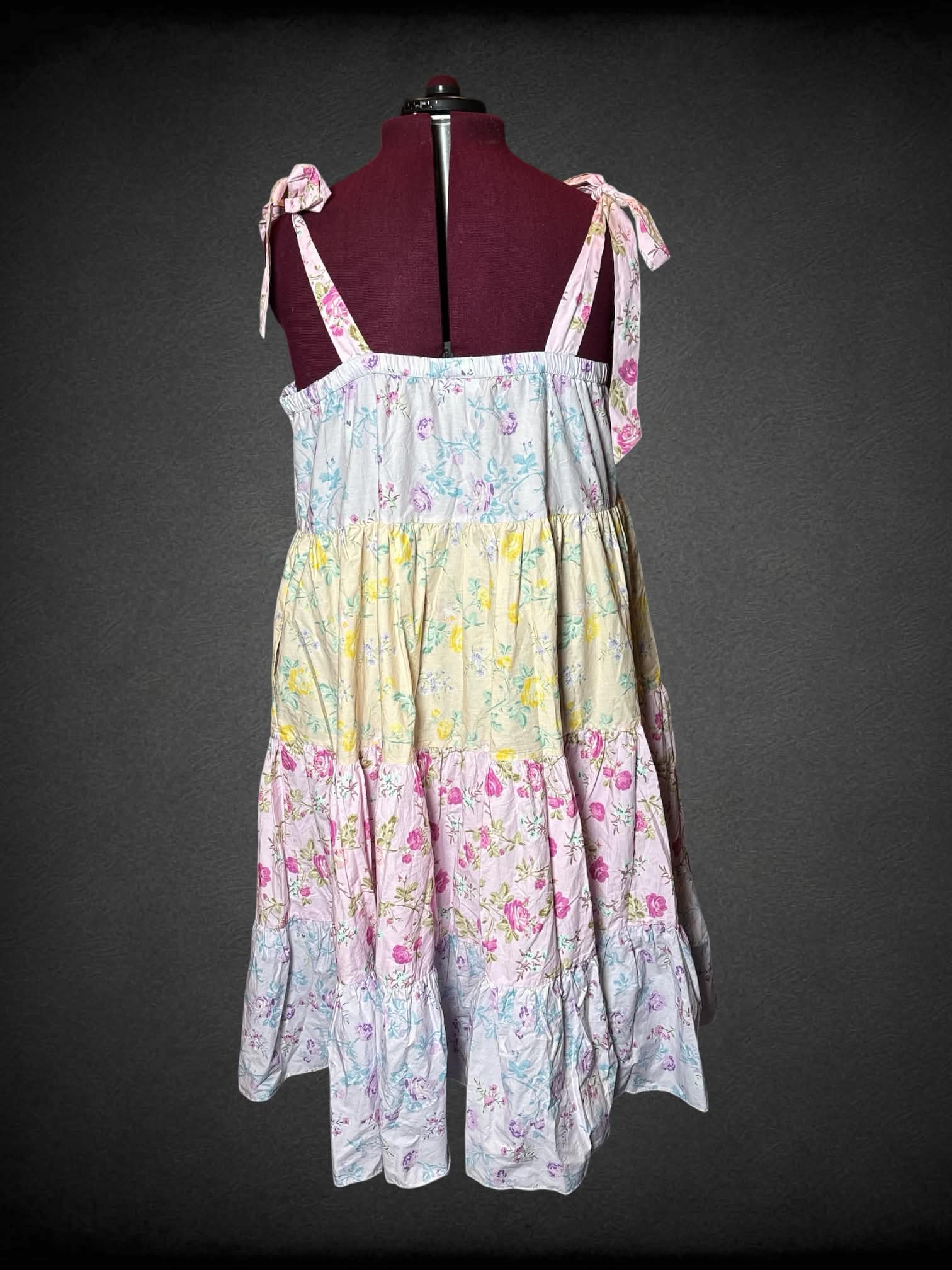 2X Love Shack Fancy NWT yellow, purple & pink pastel sun dress with floral pattern, pockets, and adjustable tie straps