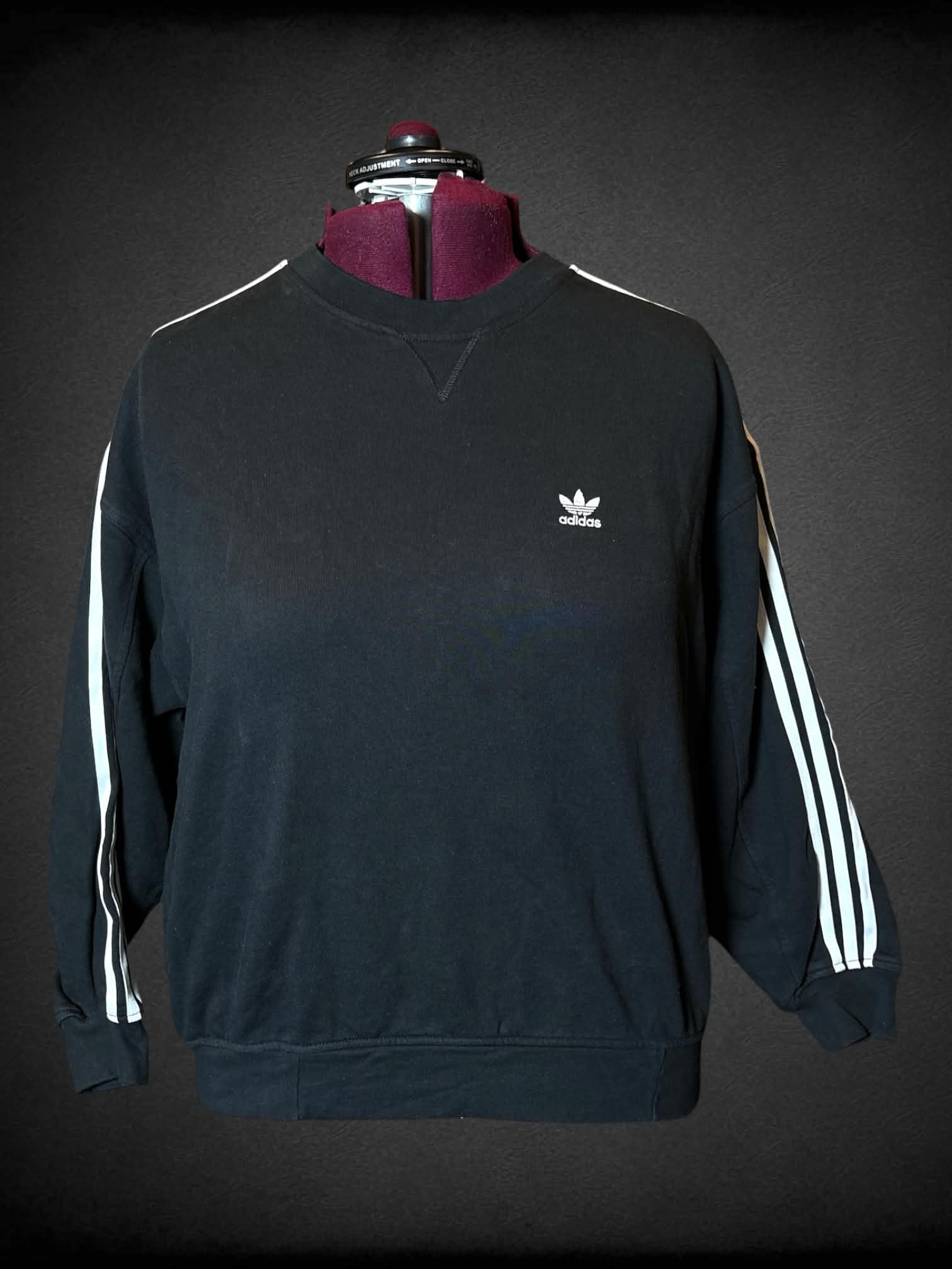 3X Adidas black crewneck with embroidered “Adidas” logo on front, and white striped design on sleeves