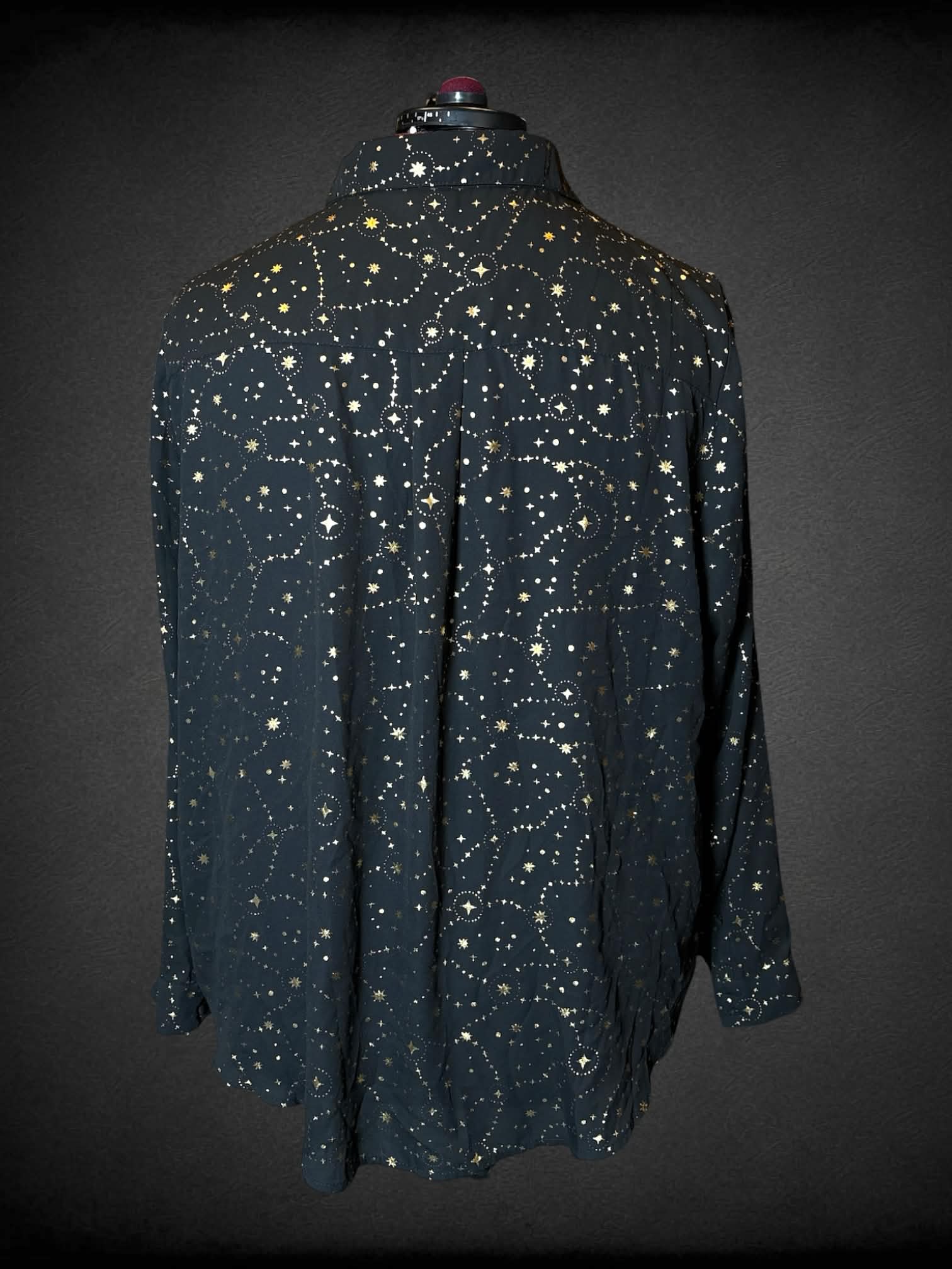 3X Torrid black button-up shirt with gold star pattern, and pockets on front