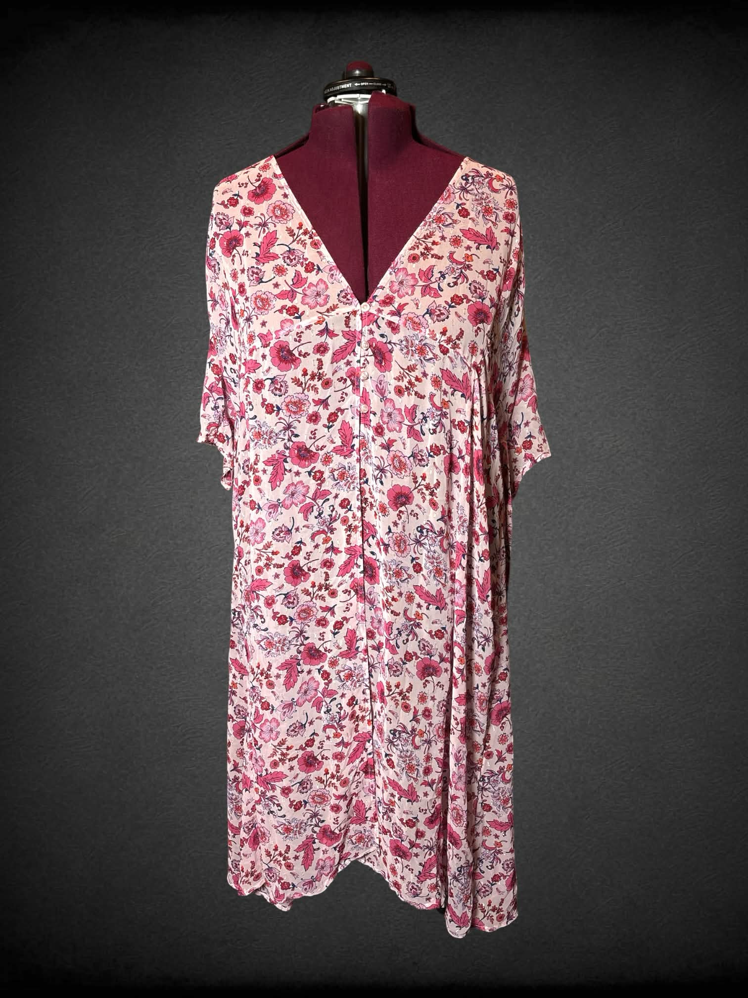 3X Torrid sheer pink flowy outer-layer dress with floral pattern, tie around waist, and buttons on front