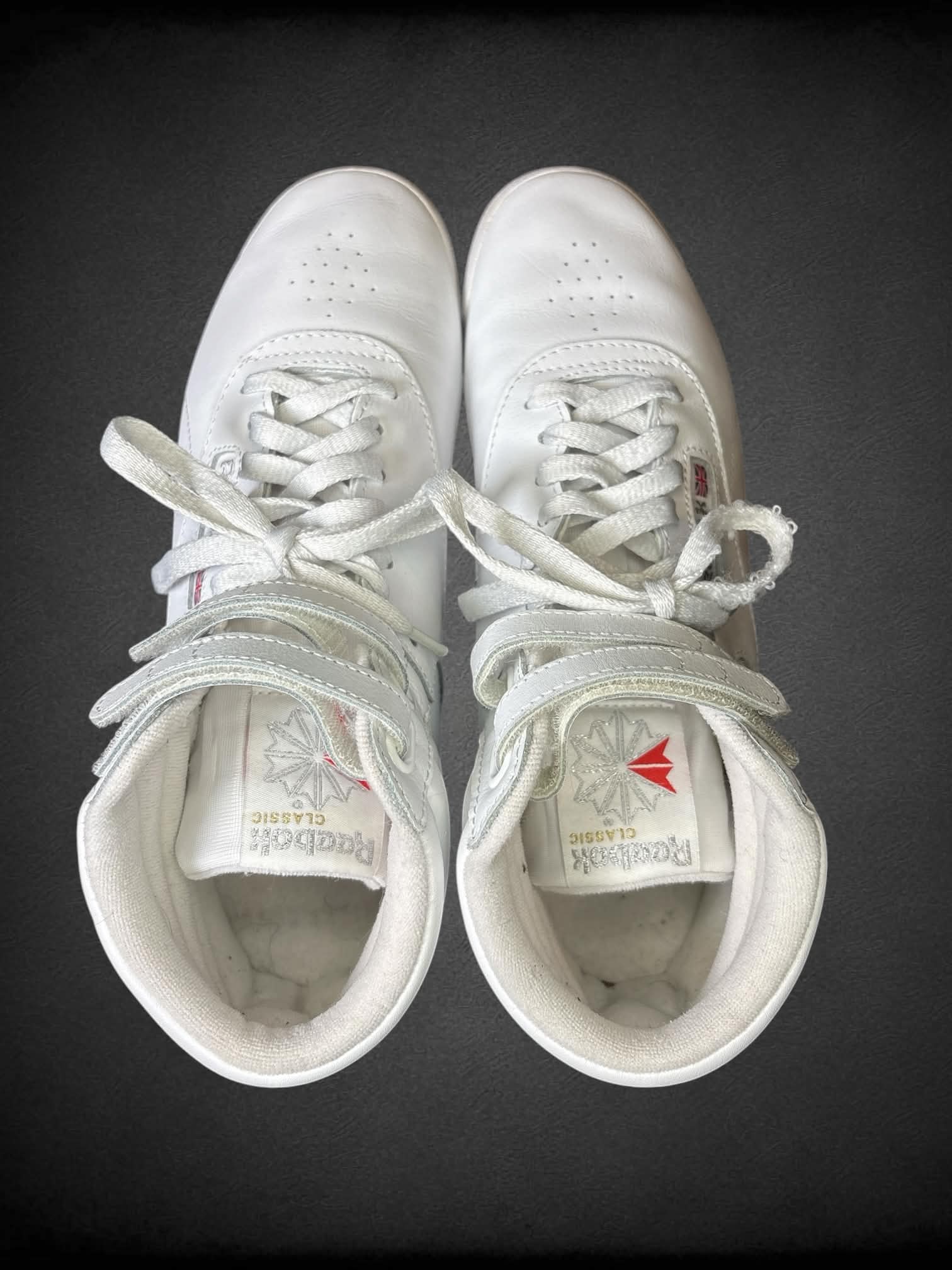 Size 9 Reebok white high-top sneakers