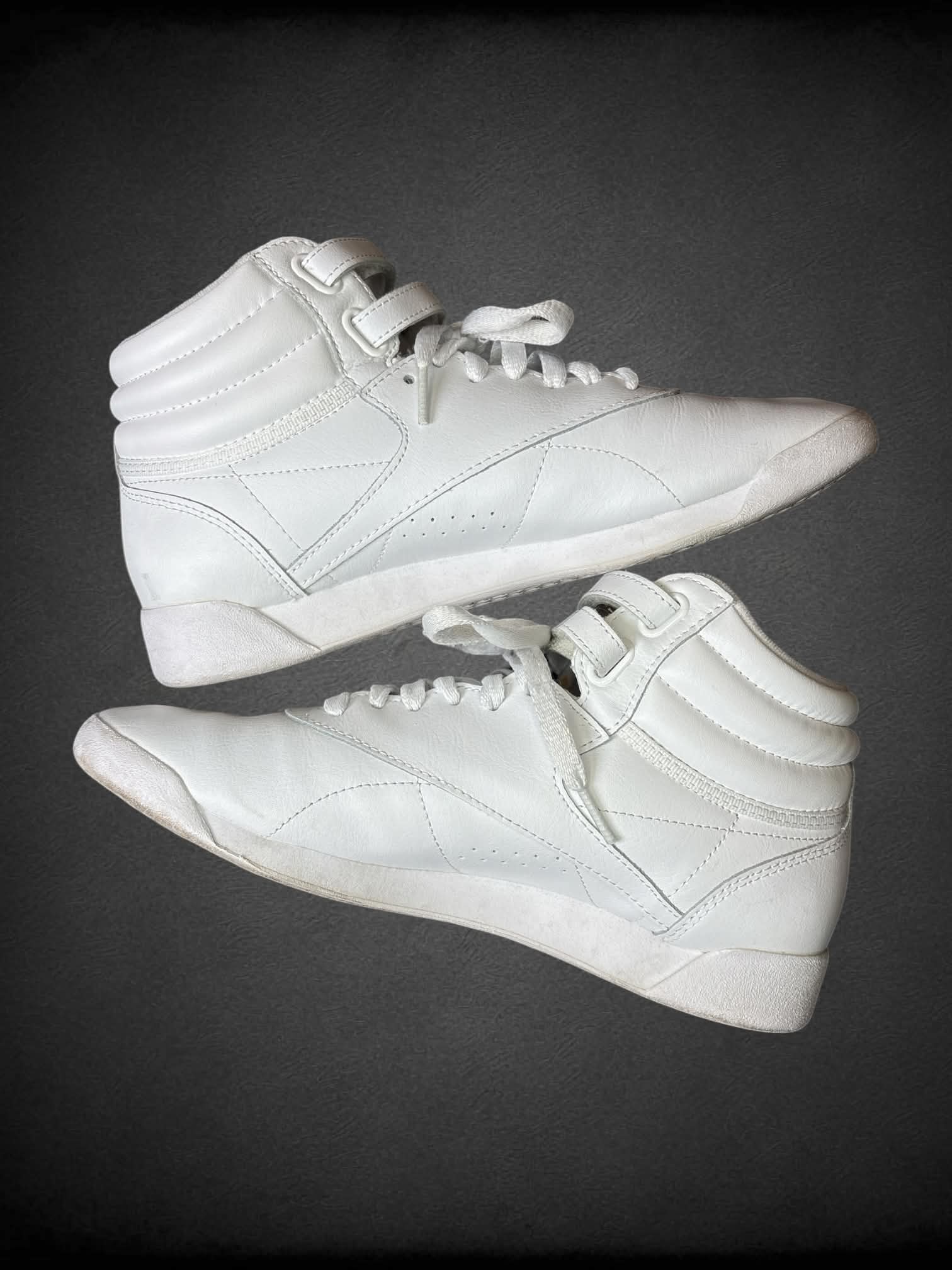 Size 9 Reebok white high-top sneakers