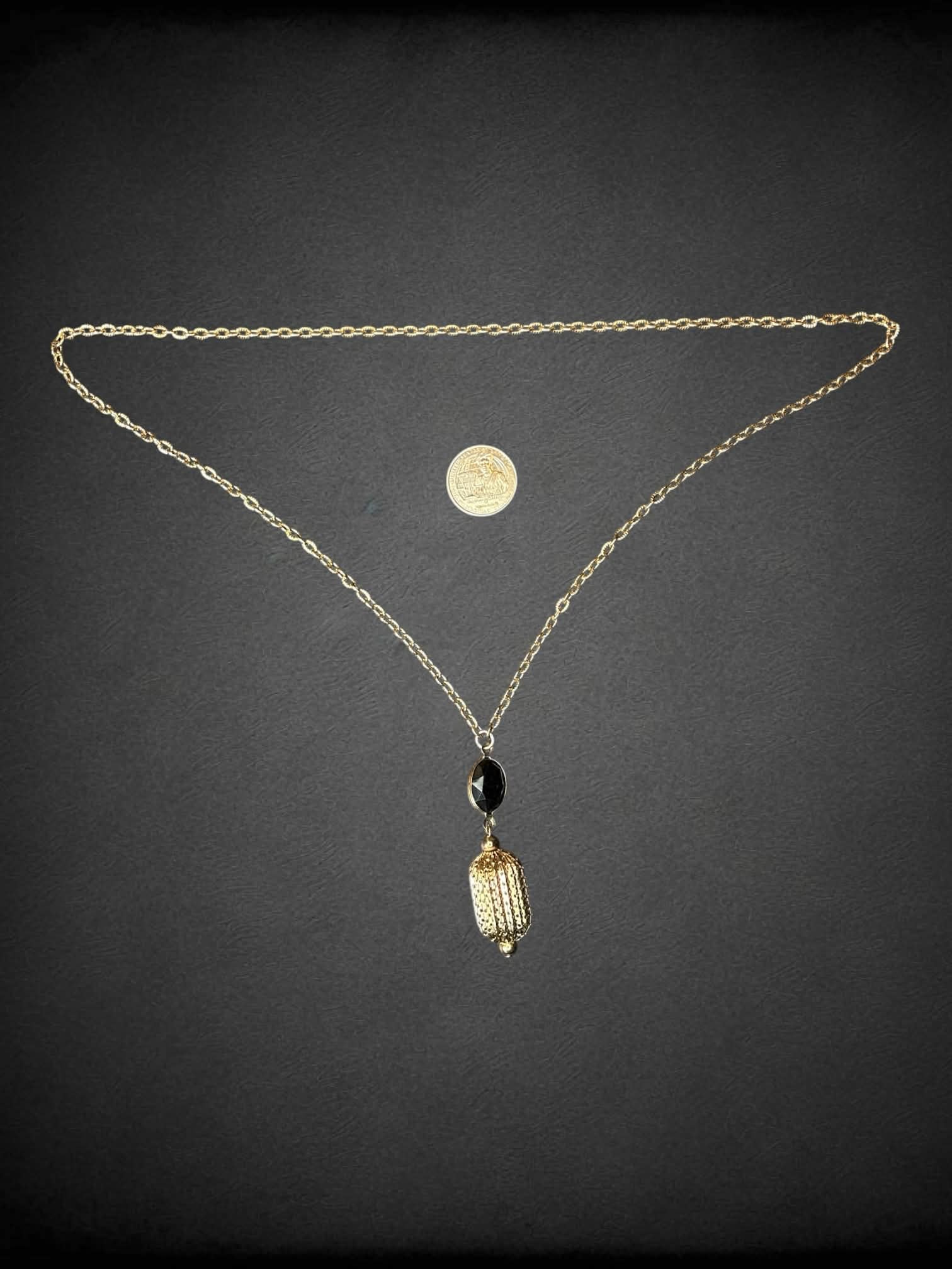 Vintage gold chain necklace with ornamental charm