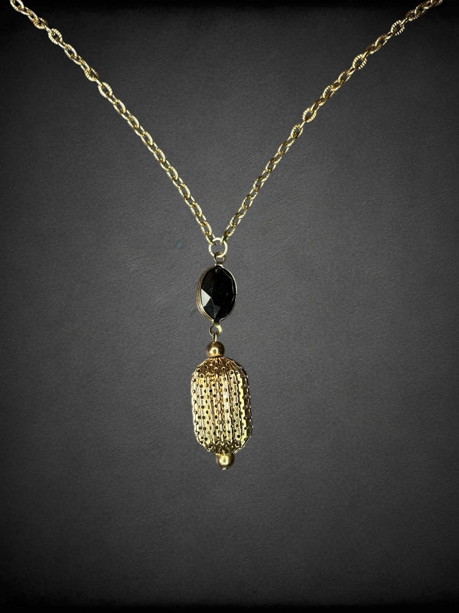Vintage gold chain necklace with ornamental charm