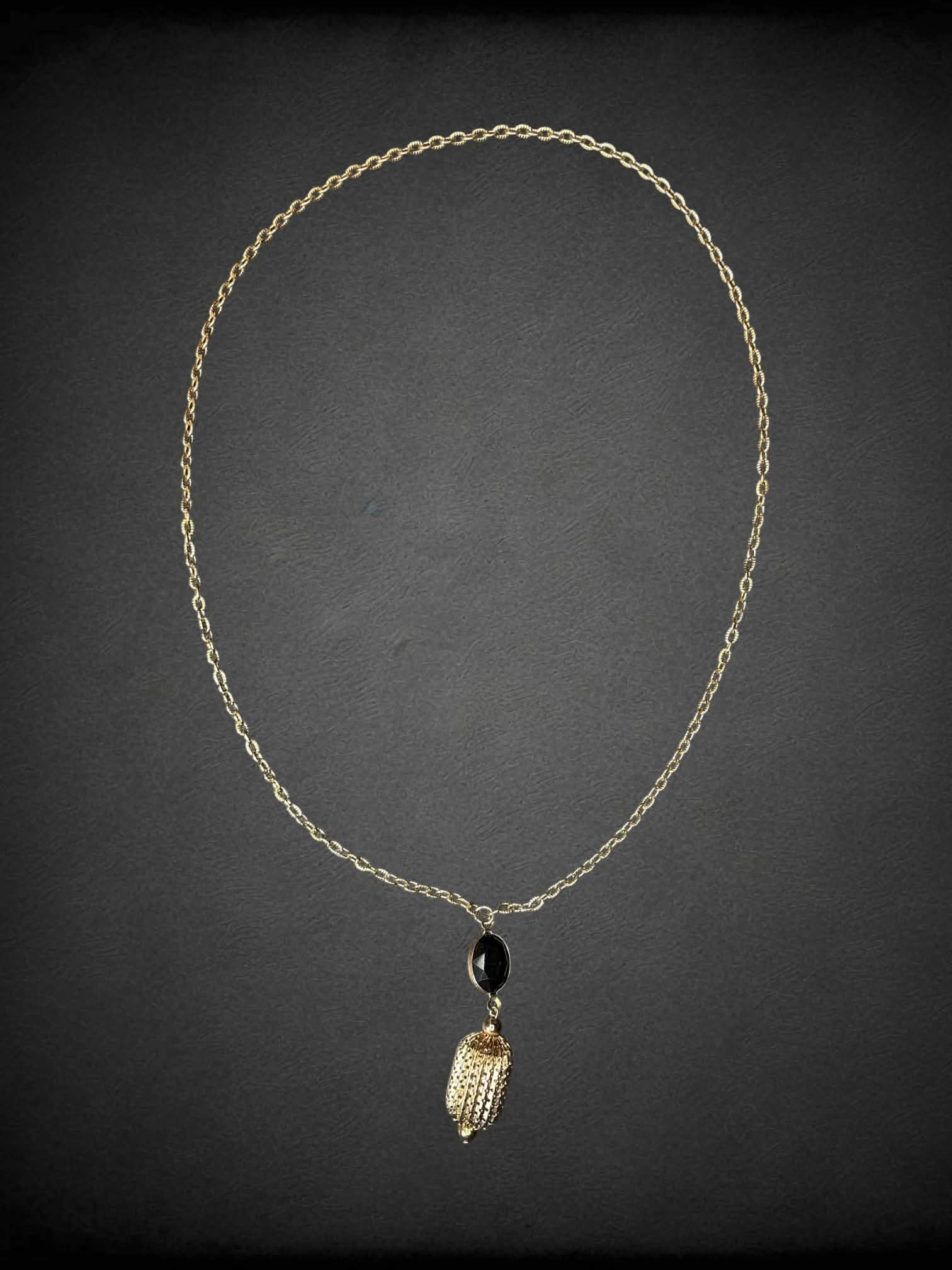 Vintage gold chain necklace with ornamental charm