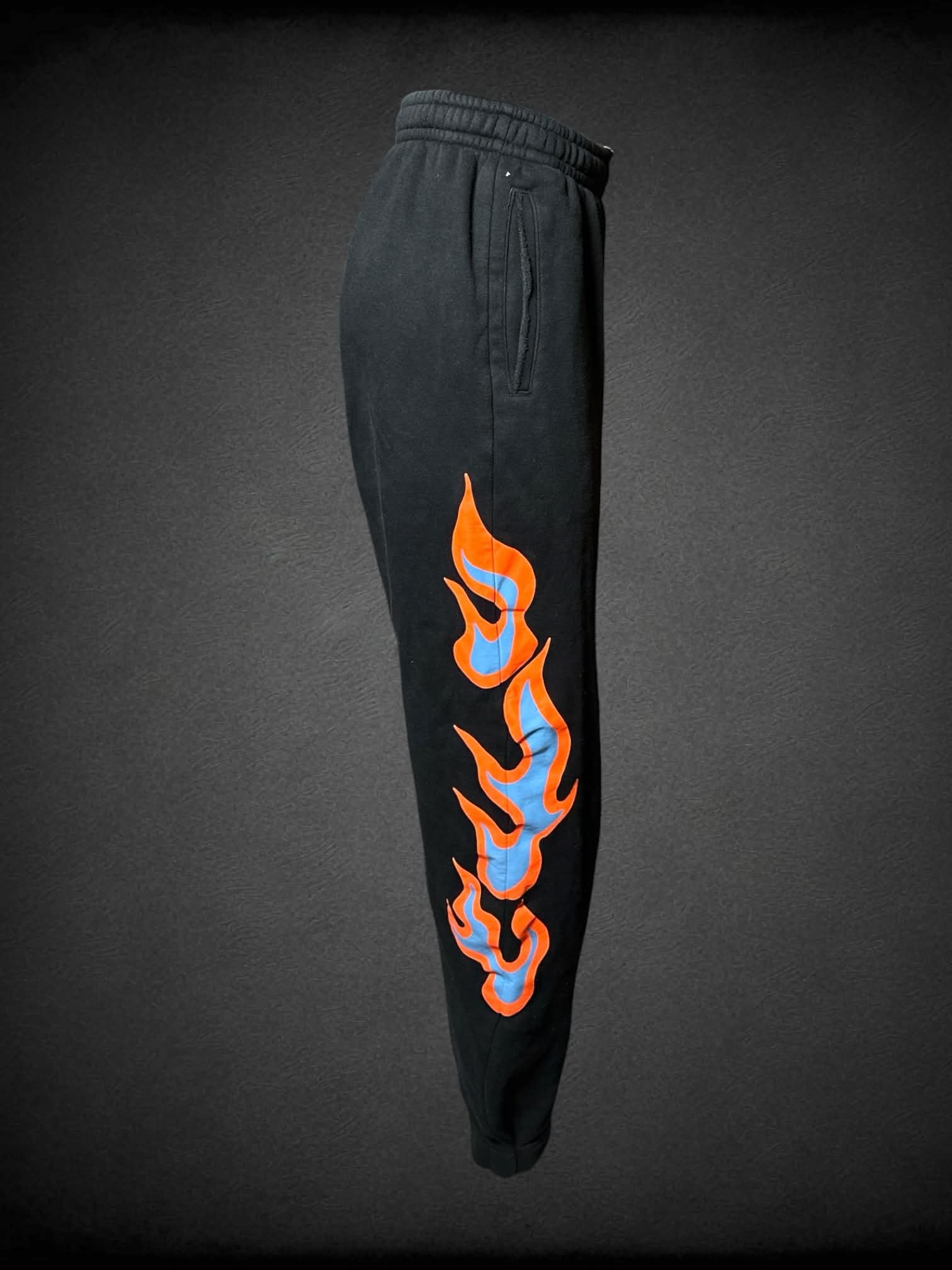 S Savage X Fenty black sweatpants with flame graphic on legs