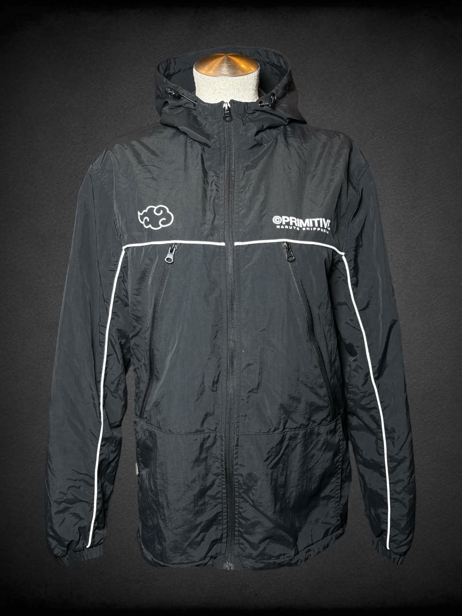 L Primitive x Naruto black windbreaker with Itachi graphic on back, and zipper pockets