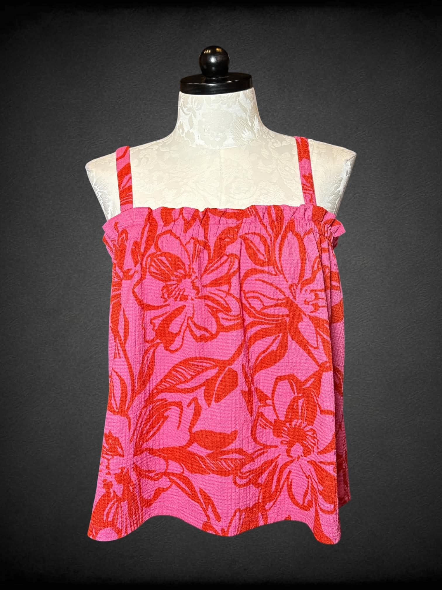 1X Papaya pink tank top with hibiscus pattern, and shirred hemline on chest