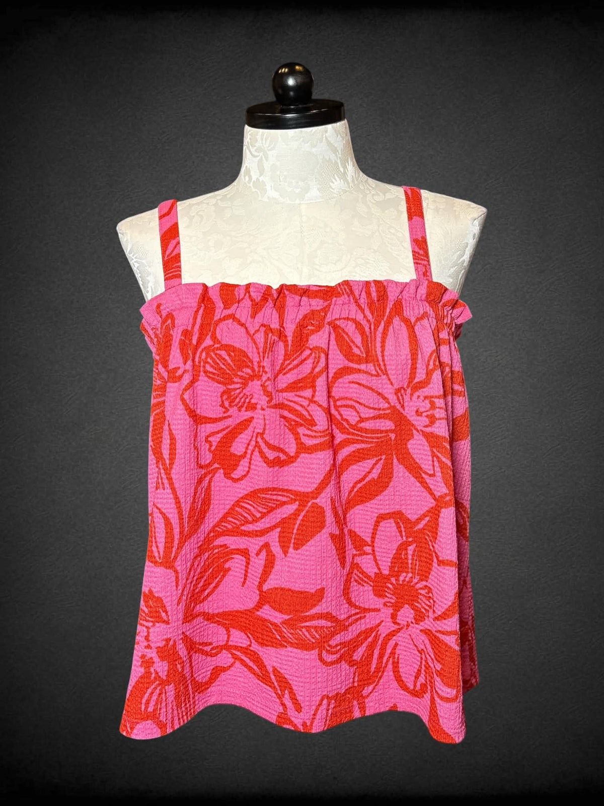 1X Papaya pink tank top with hibiscus pattern, and shirred hemline on chest
