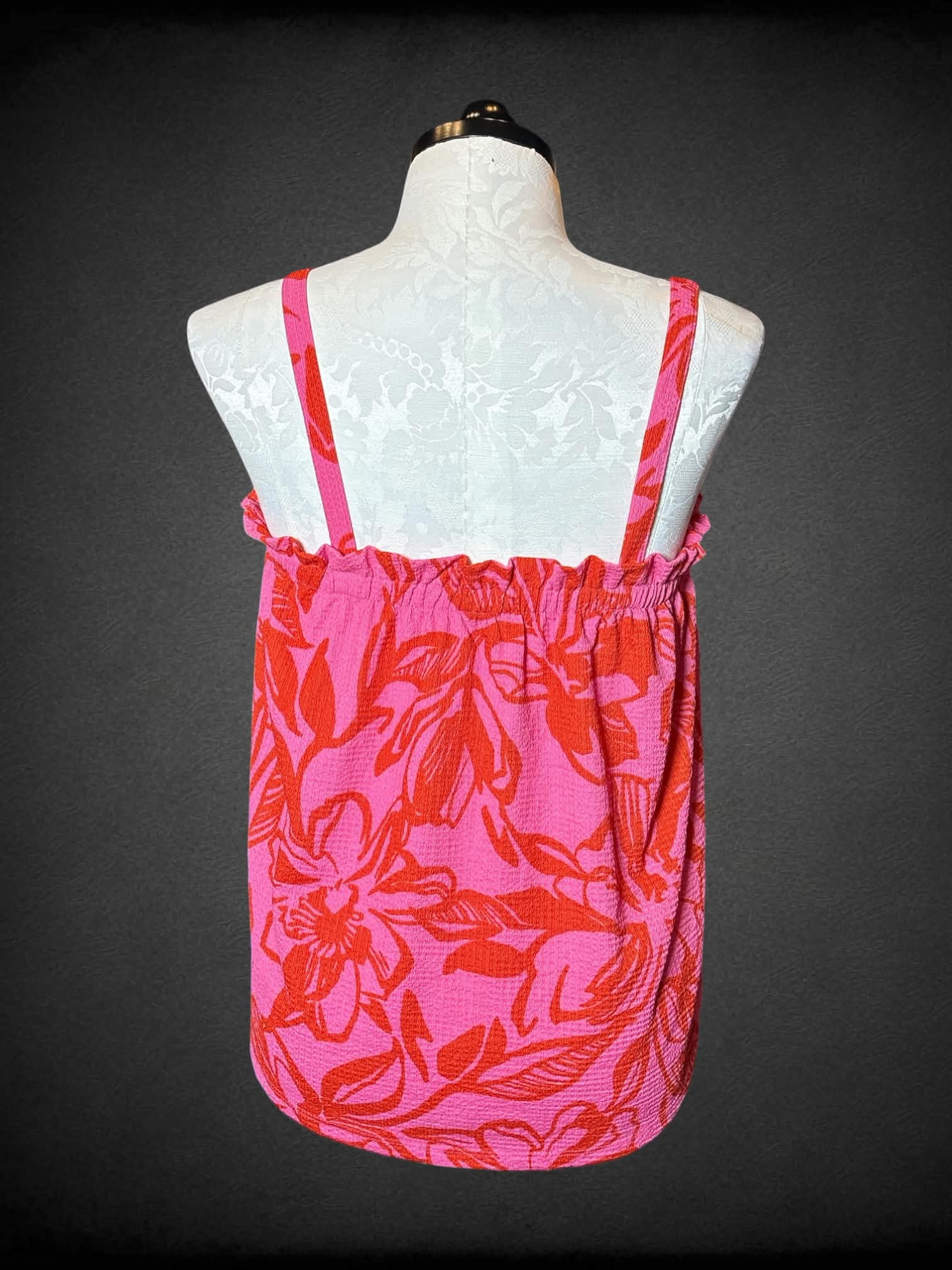 1X Papaya pink tank top with hibiscus pattern, and shirred hemline on chest