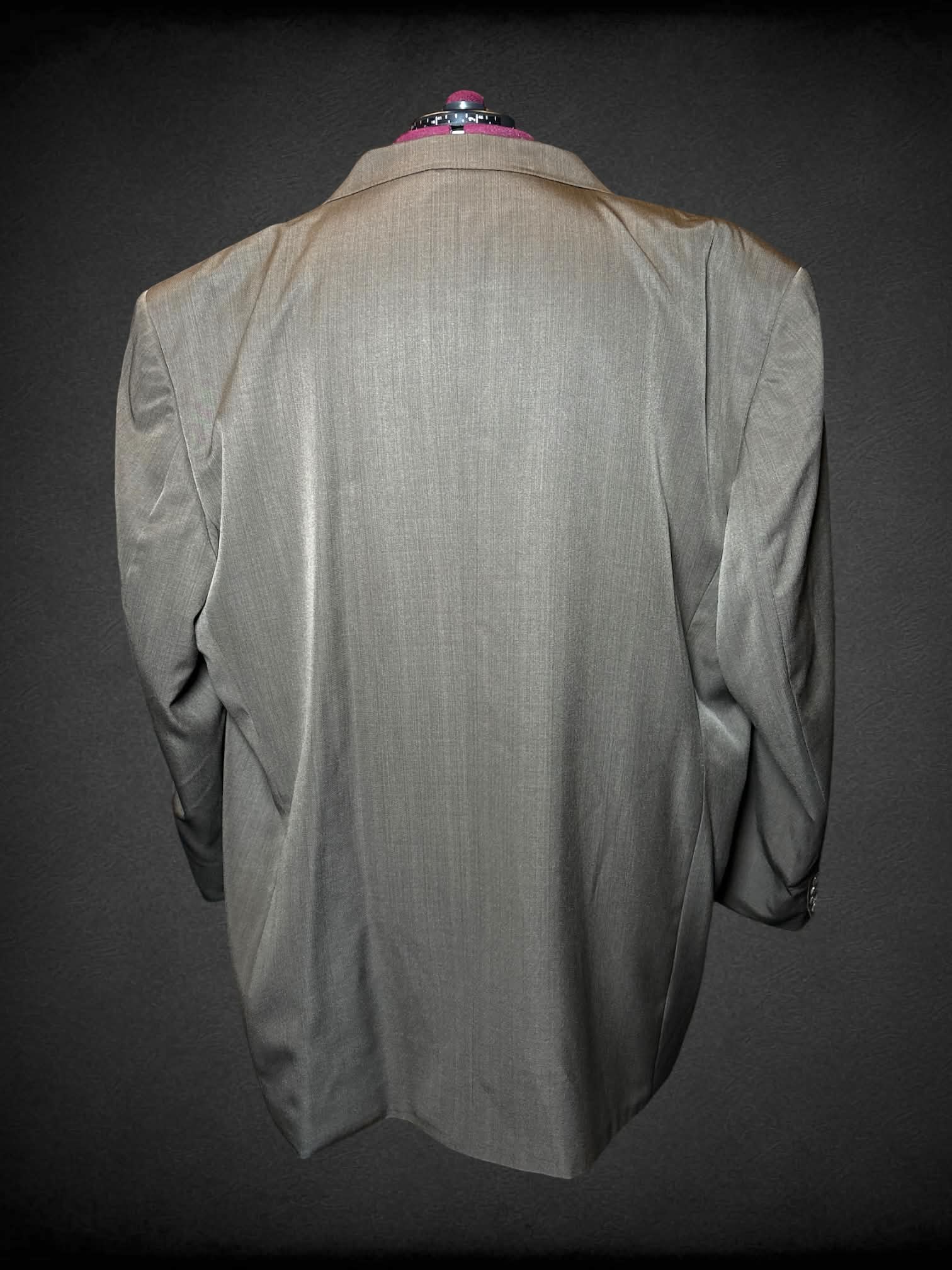 4X Zandello brown suit jacket with padded shoulders, buttons, one pocket, and two faux pockets