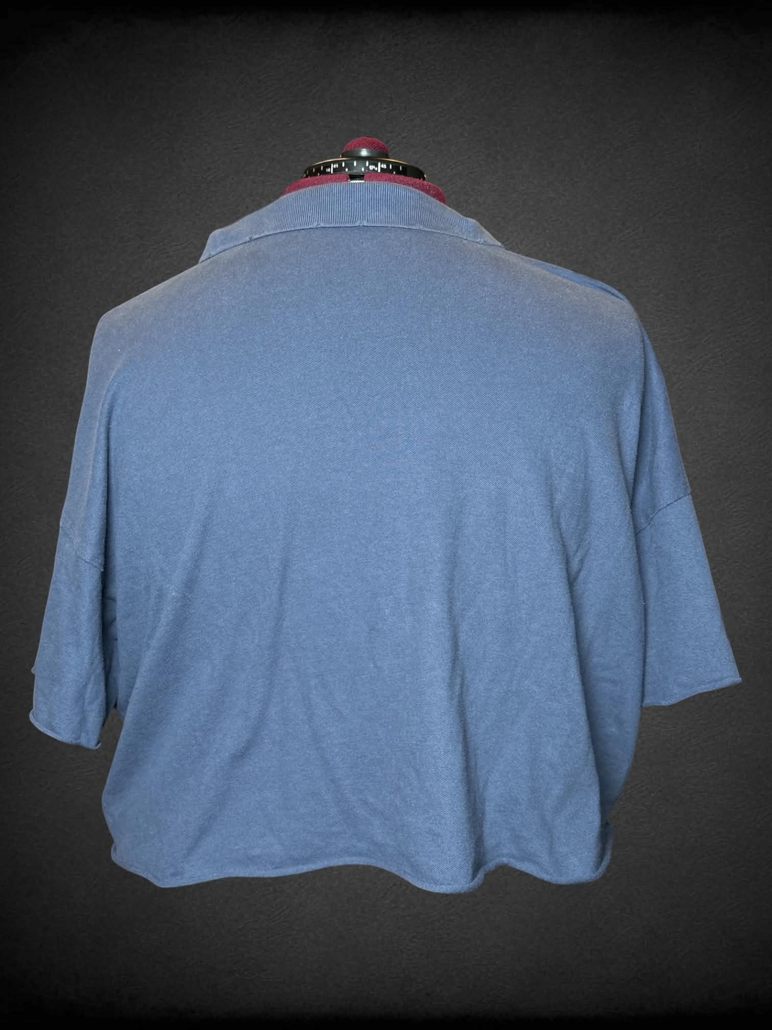 3X Offline soft blue/grey cropped polo shirt with embroidered “Offline” logo on front