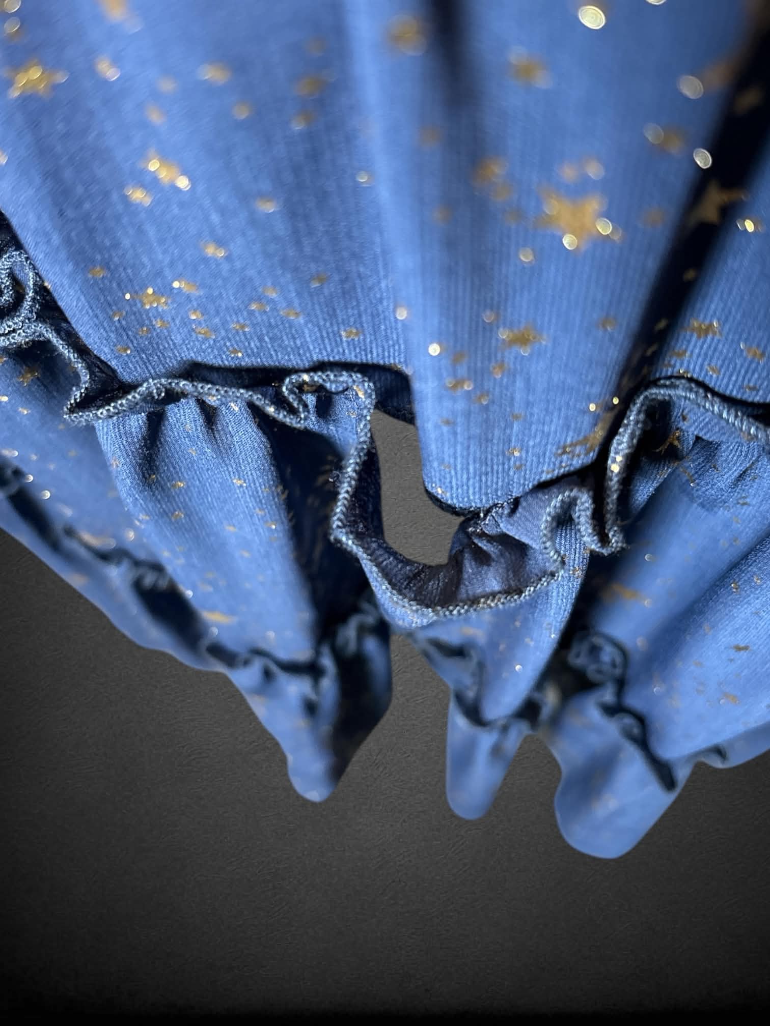 3X Ivy City midnight blue dress with gold star pattern, shirred top, and layered skirt