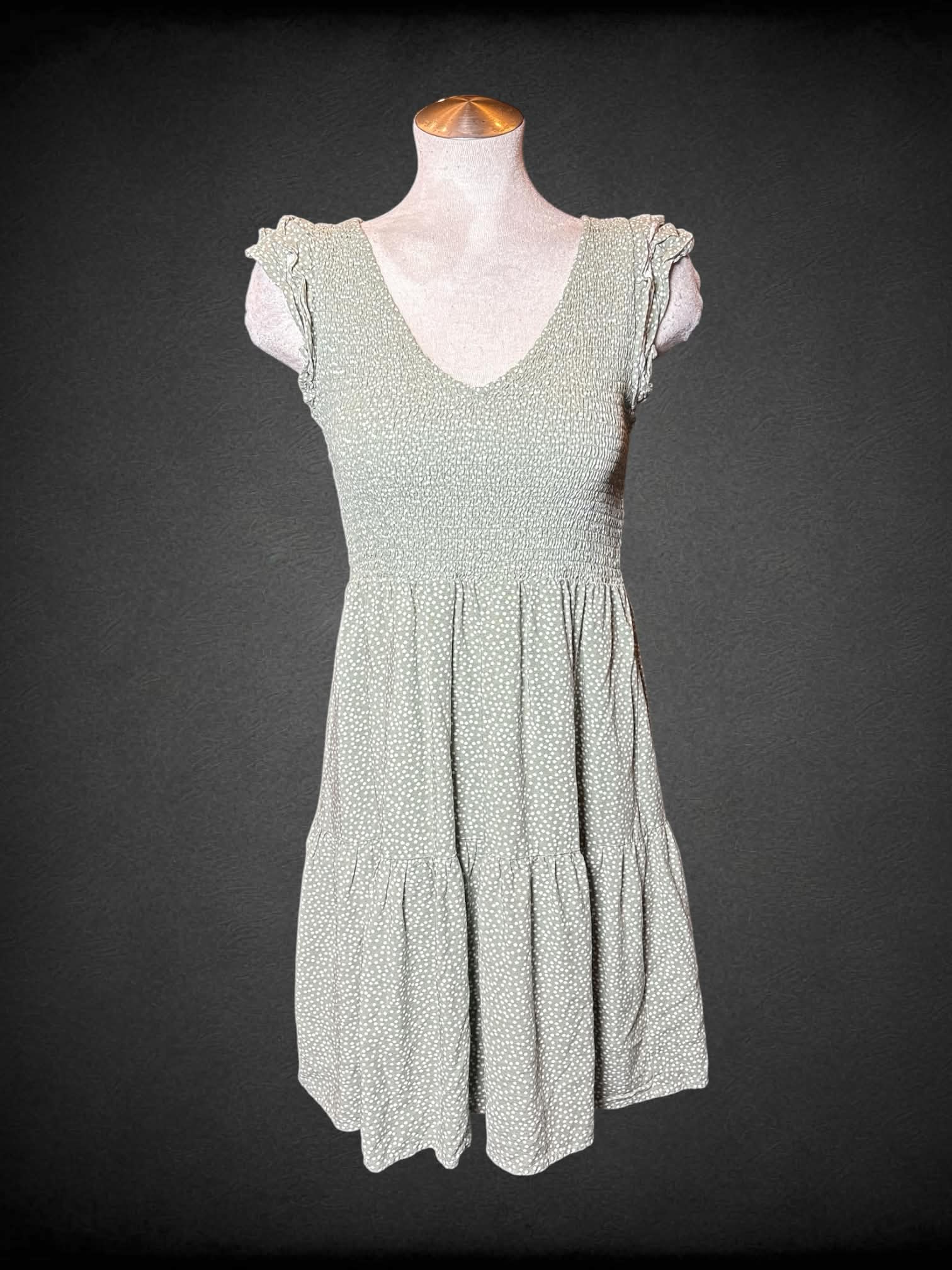 L Loft green short dress with shirred top, ruffle sleeves, and white spotted pattern