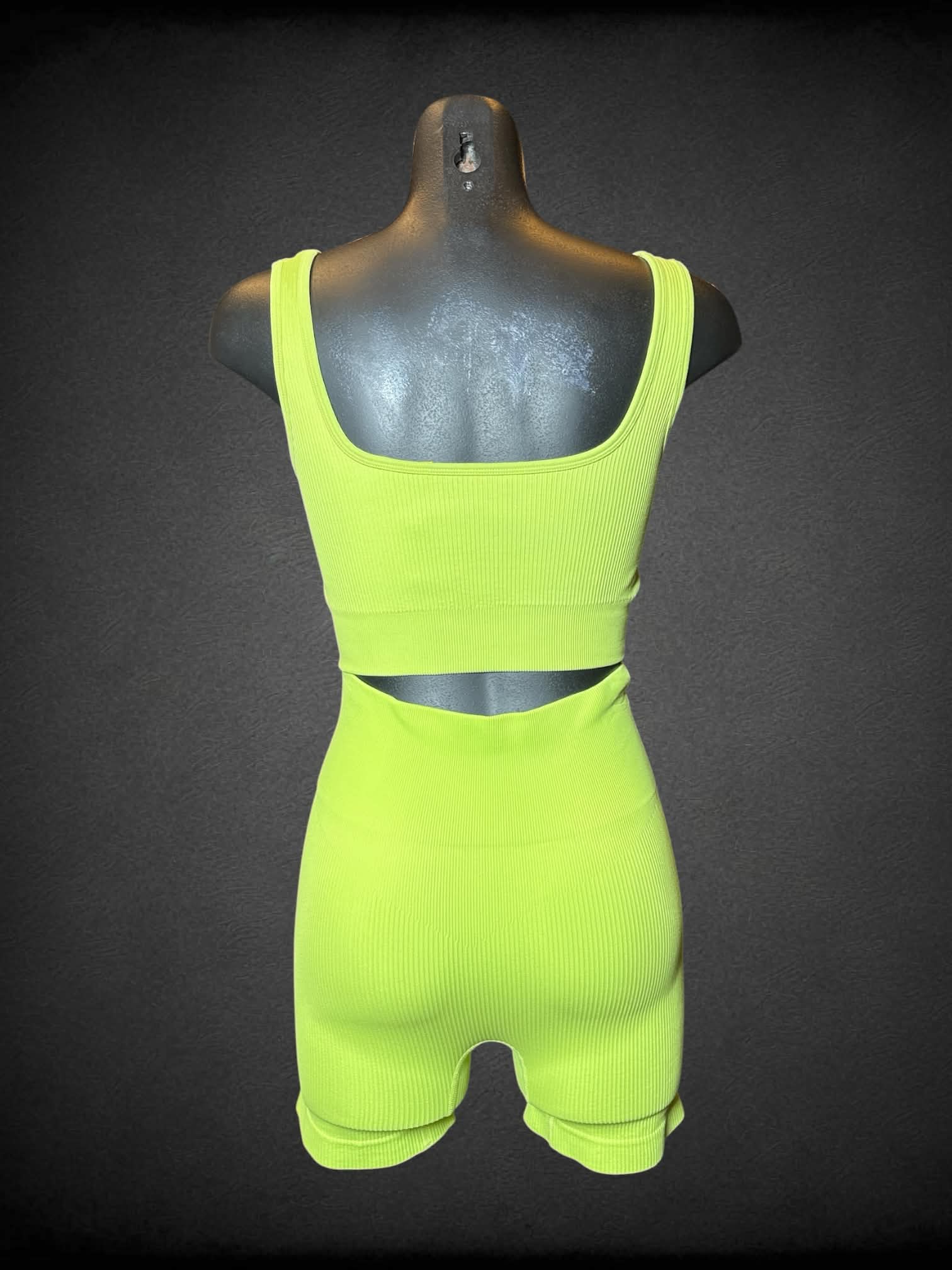 S OQQ lime green two-piece athletic set with shorts and top