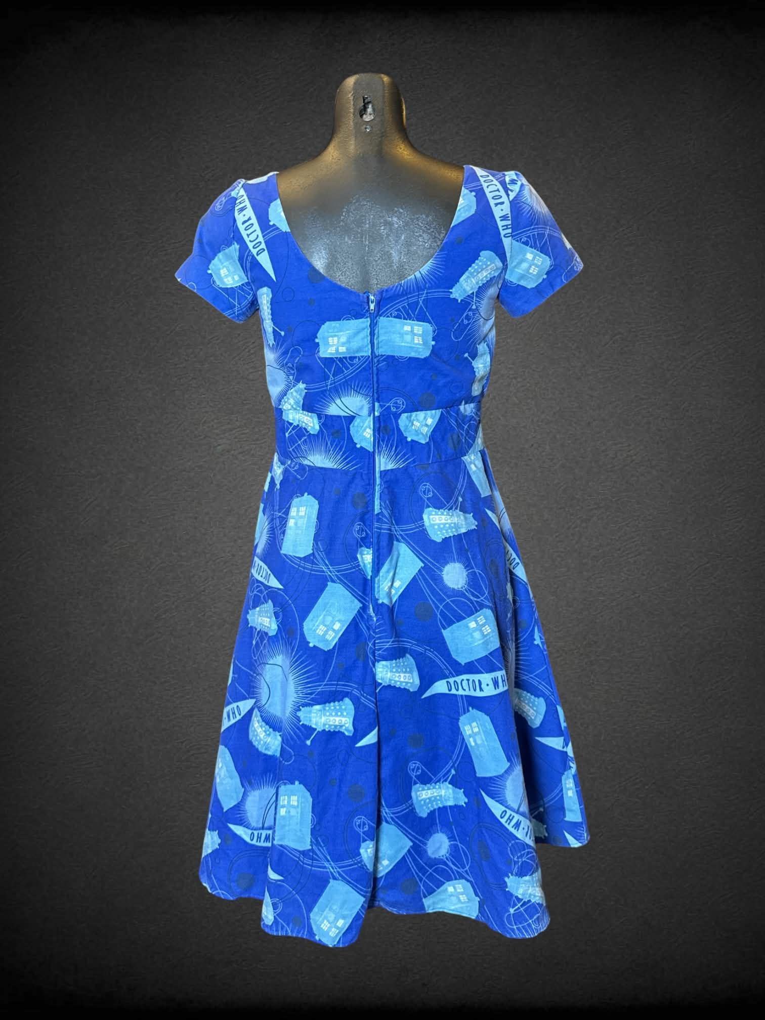 XS Sweetcheeks Stitches blue short dress with “Doctor Who” pattern, and zipper on back