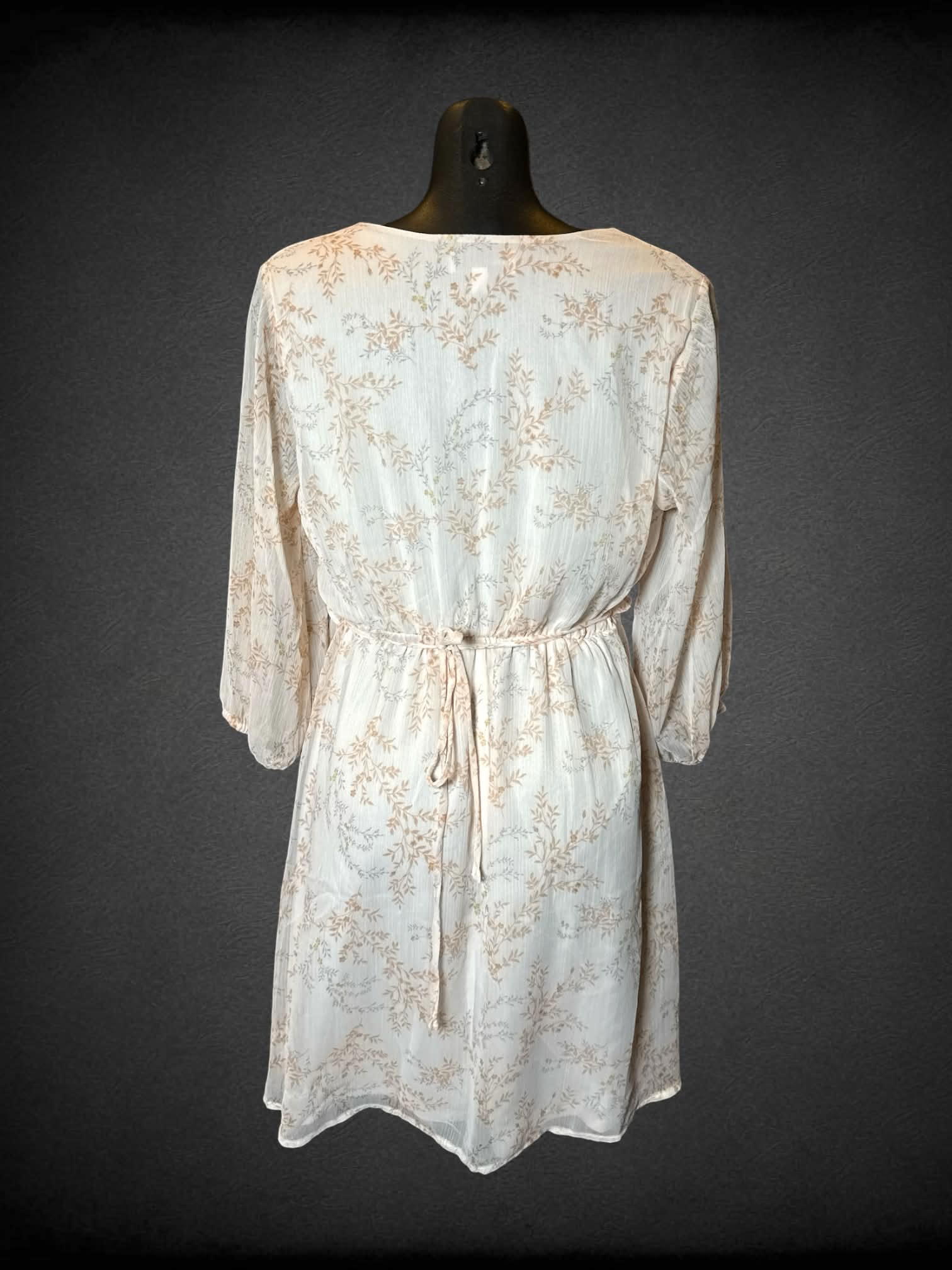 M Gilli sheer pink short dress with floral pattern, decorative buttons, and tie on waist