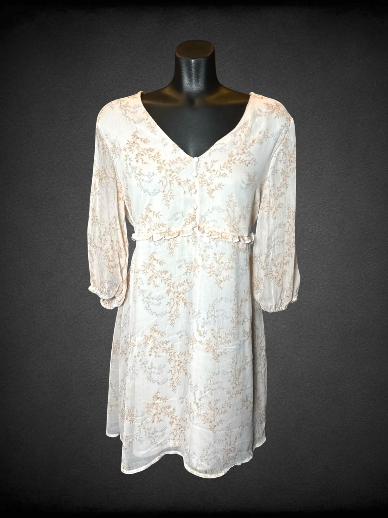 M Gilli sheer pink short dress with floral pattern, decorative buttons, and tie on waist