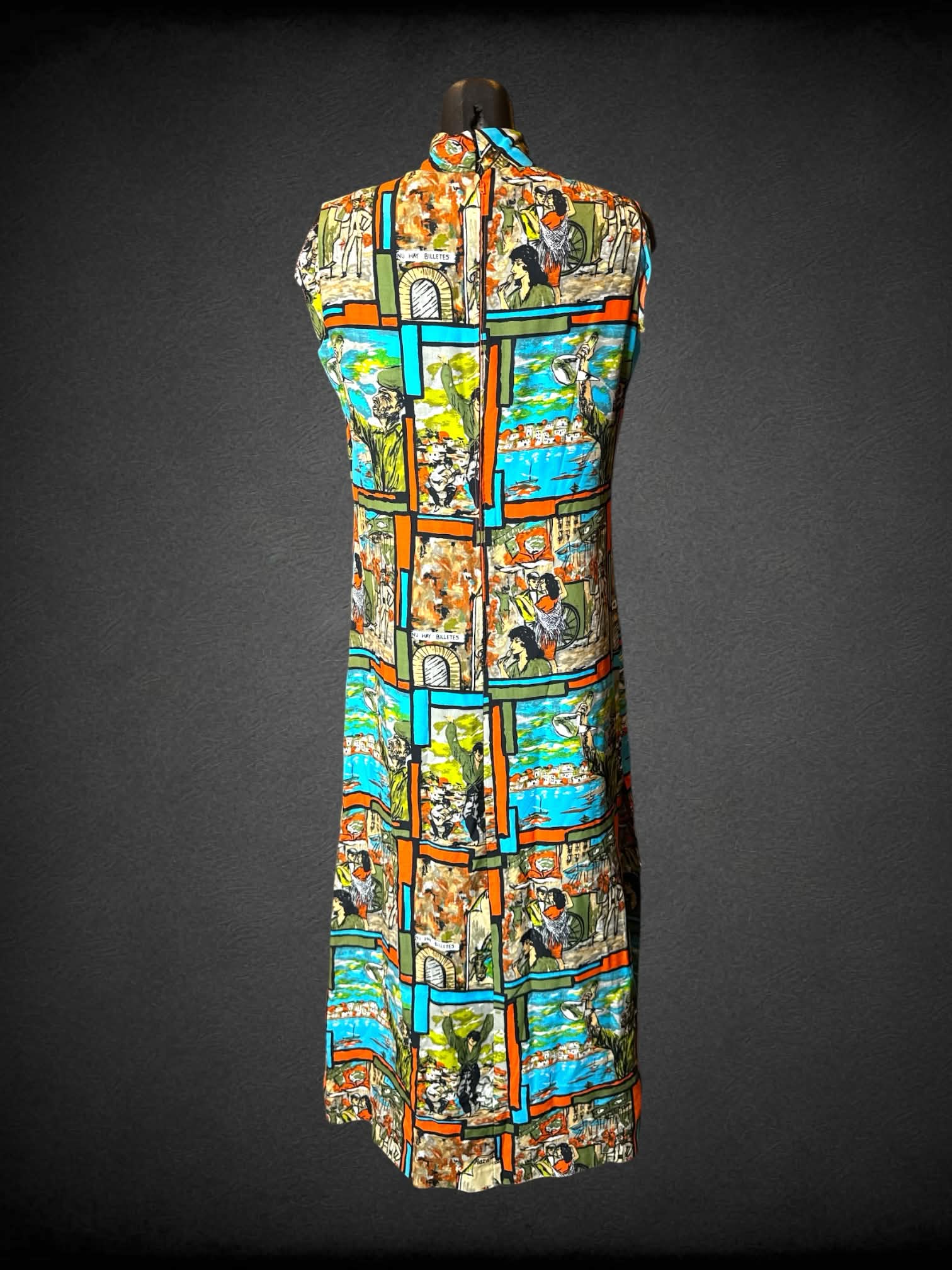 M homemade blue turtleneck dress with painted collage design, and zipper on back