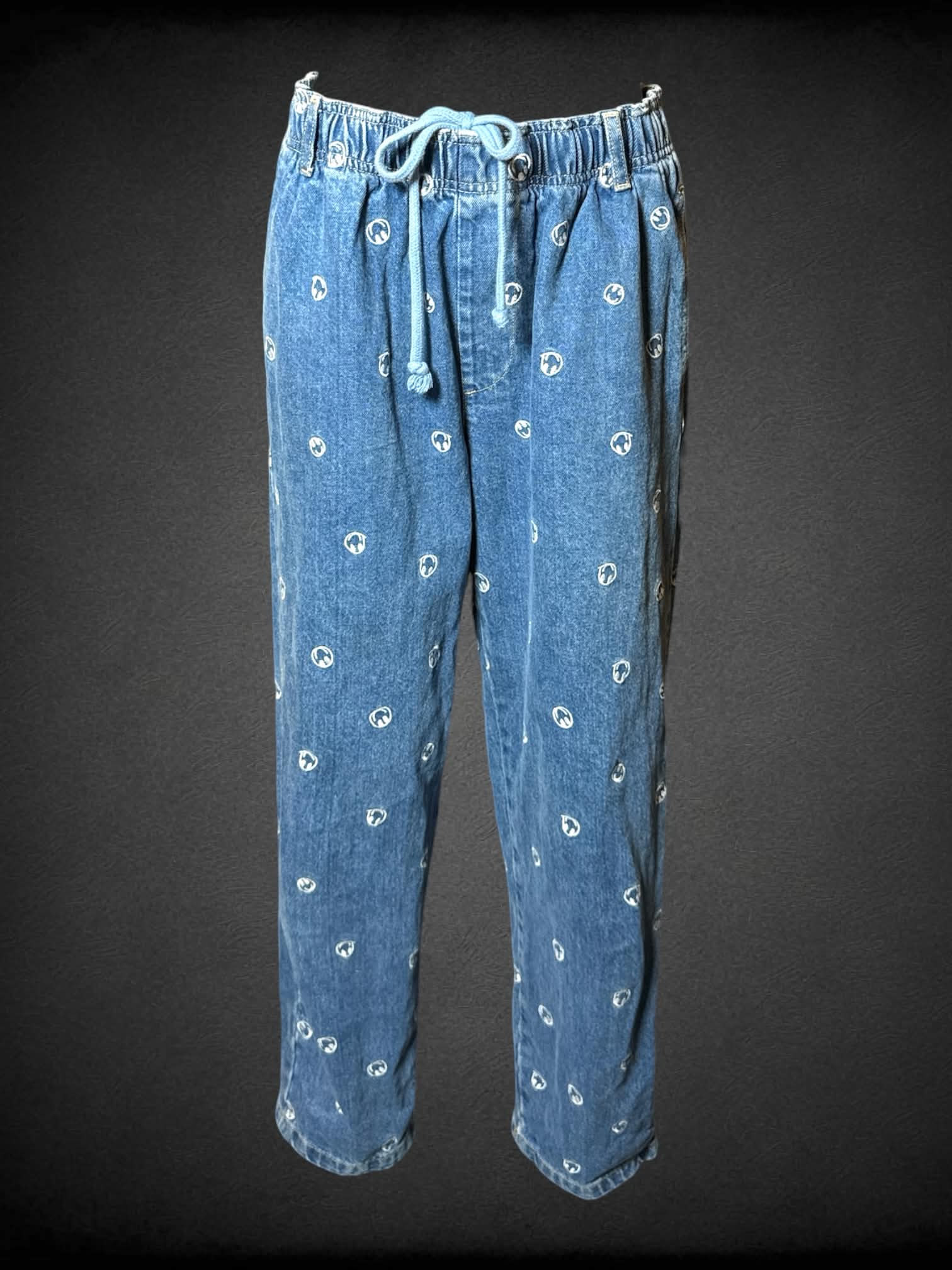 M BDG blue denim pants with embroidered smiley face pattern, and stretch waist