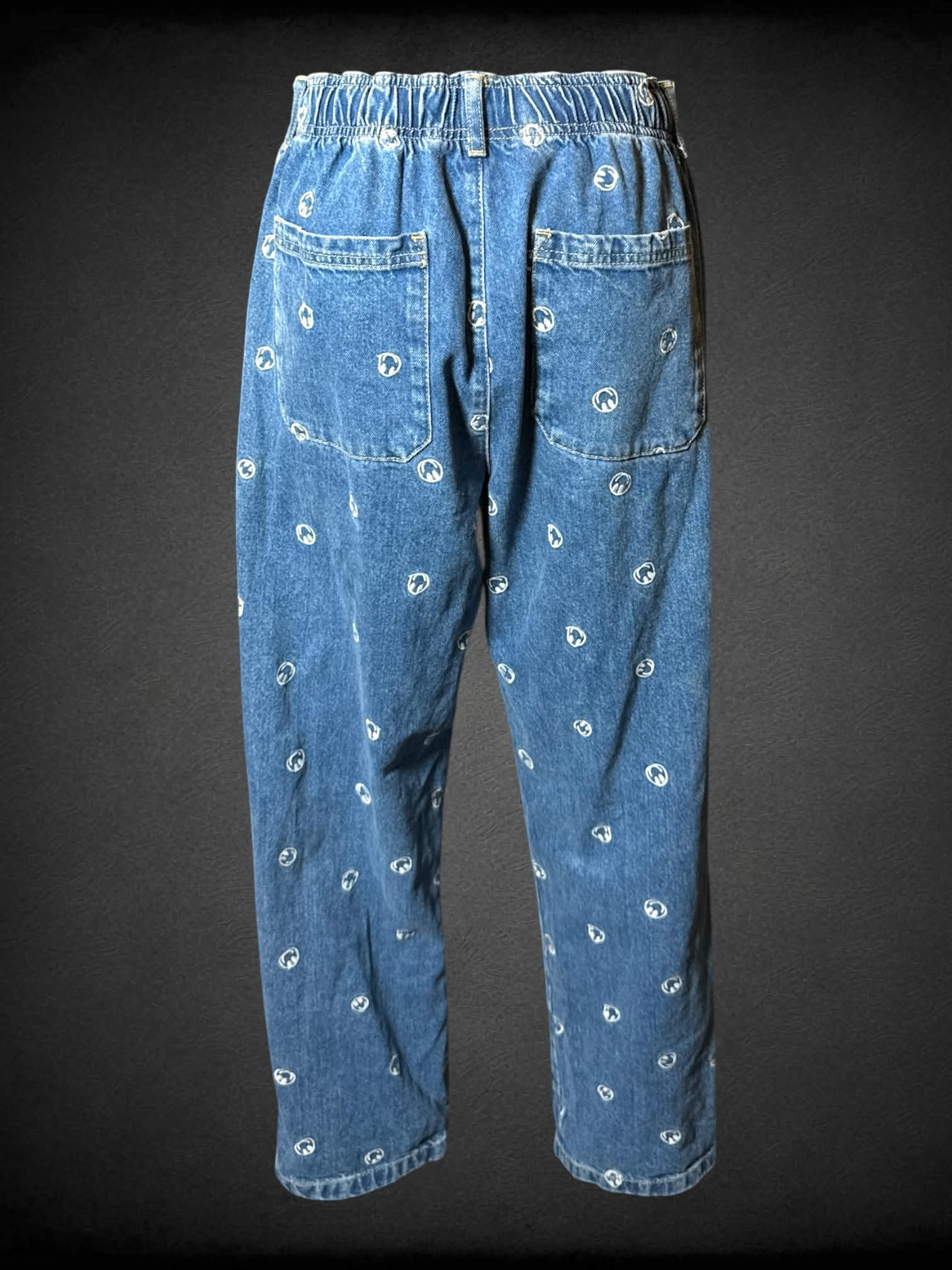 M BDG blue denim pants with embroidered smiley face pattern, and stretch waist