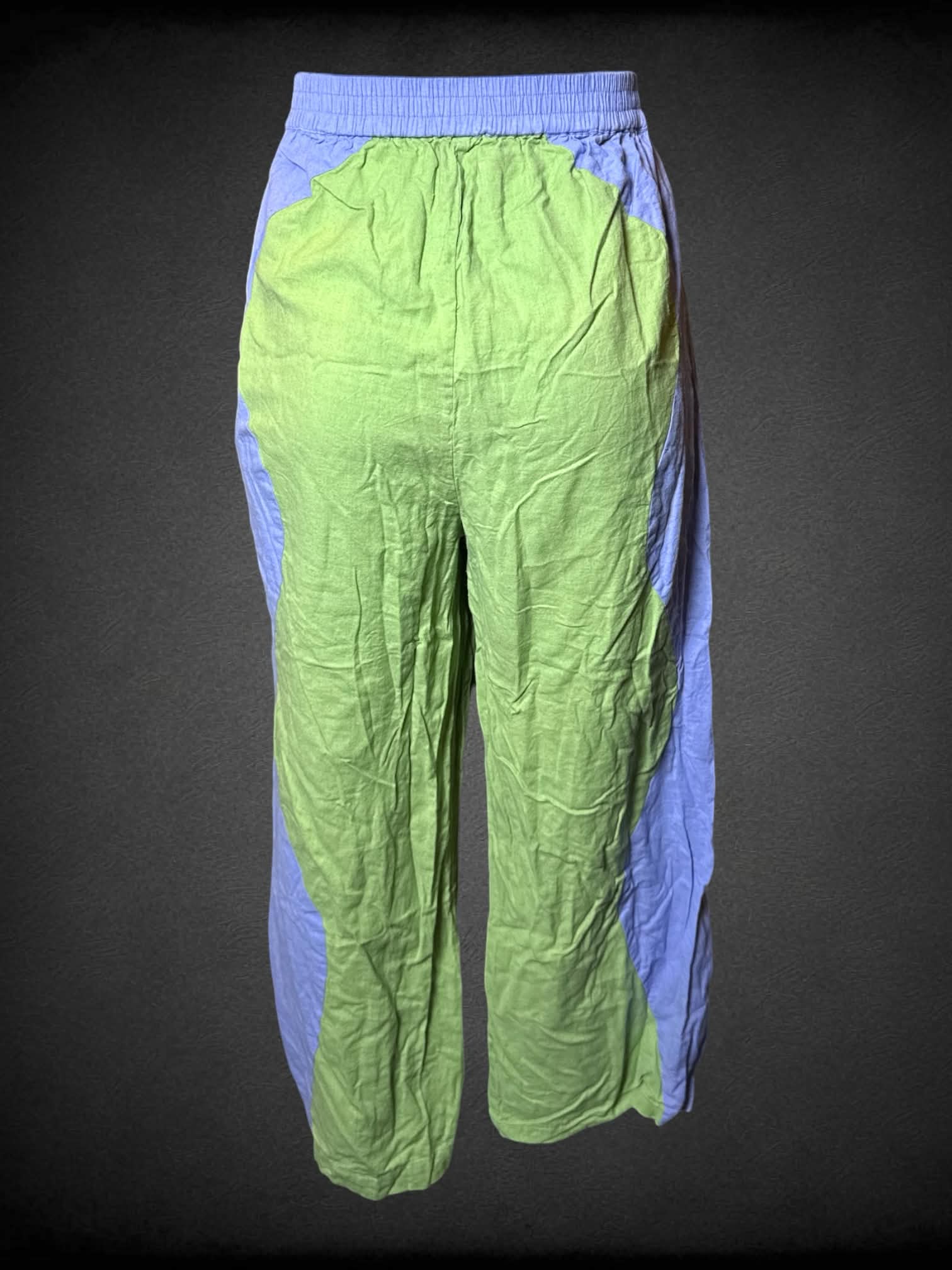 L Rujuta Sheth green and purple pants with stretch waist, and pockets on front