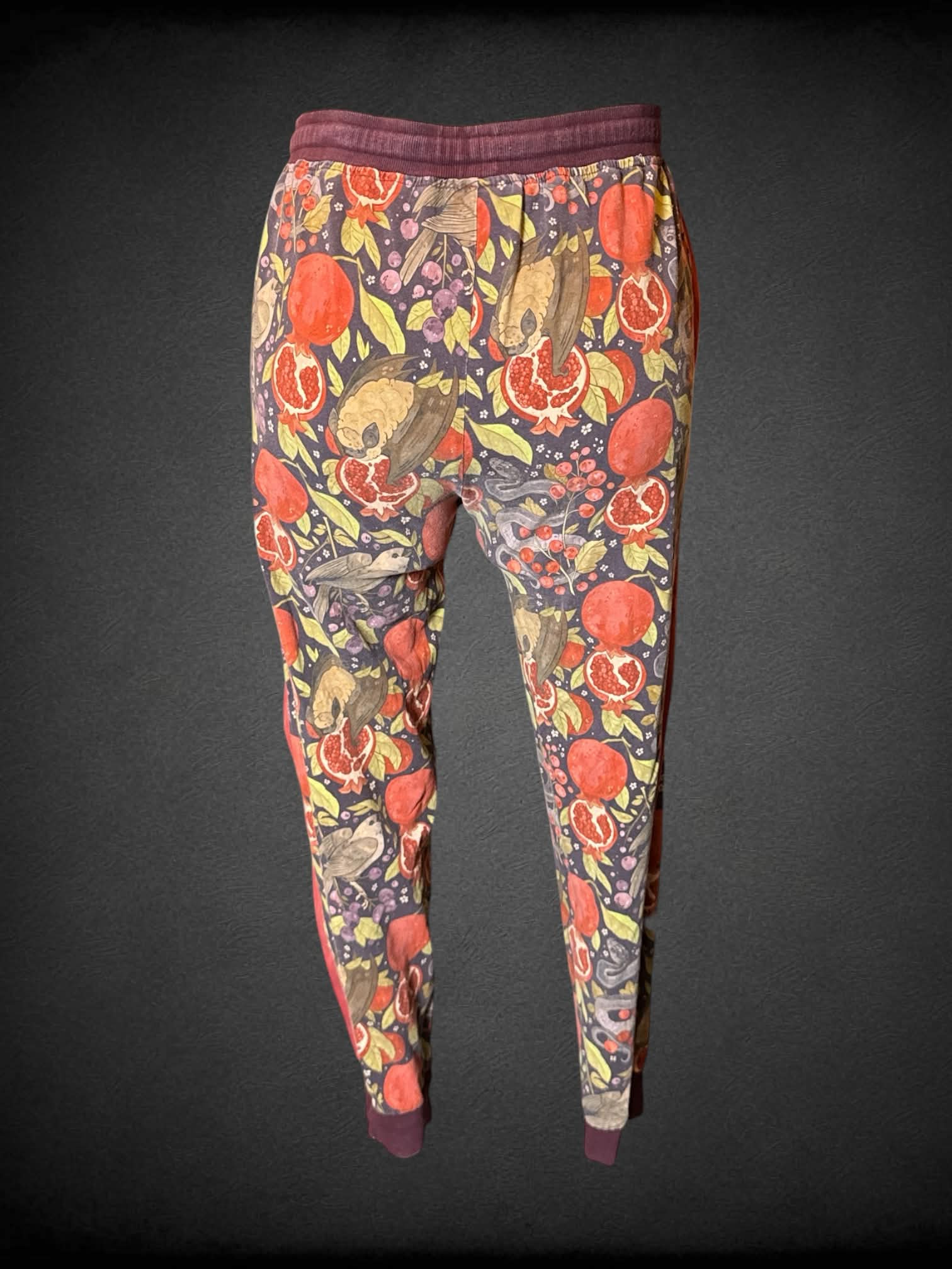 XL Morning Witch purple pants with pomegranate and animal pattern, zipper pockets, and stretch waist